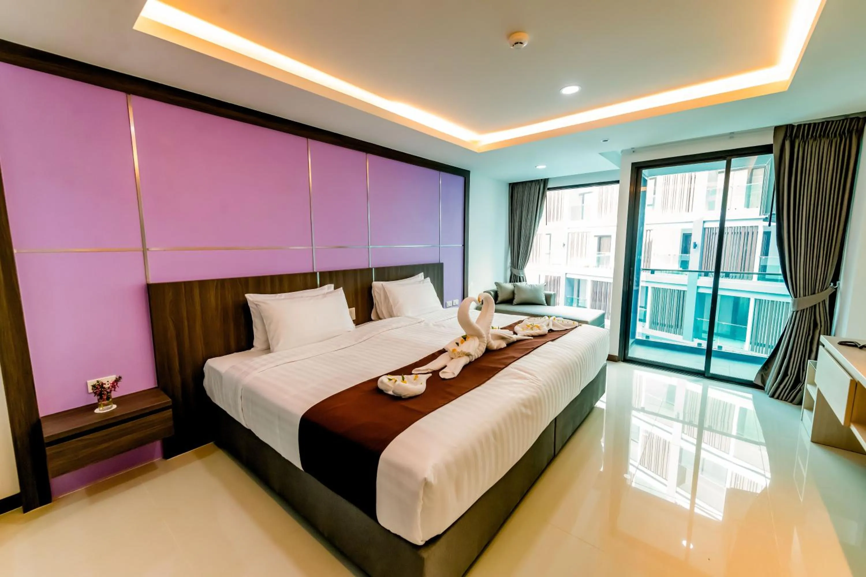 Bed in The Proud Hotel Pattaya - SHA Certified