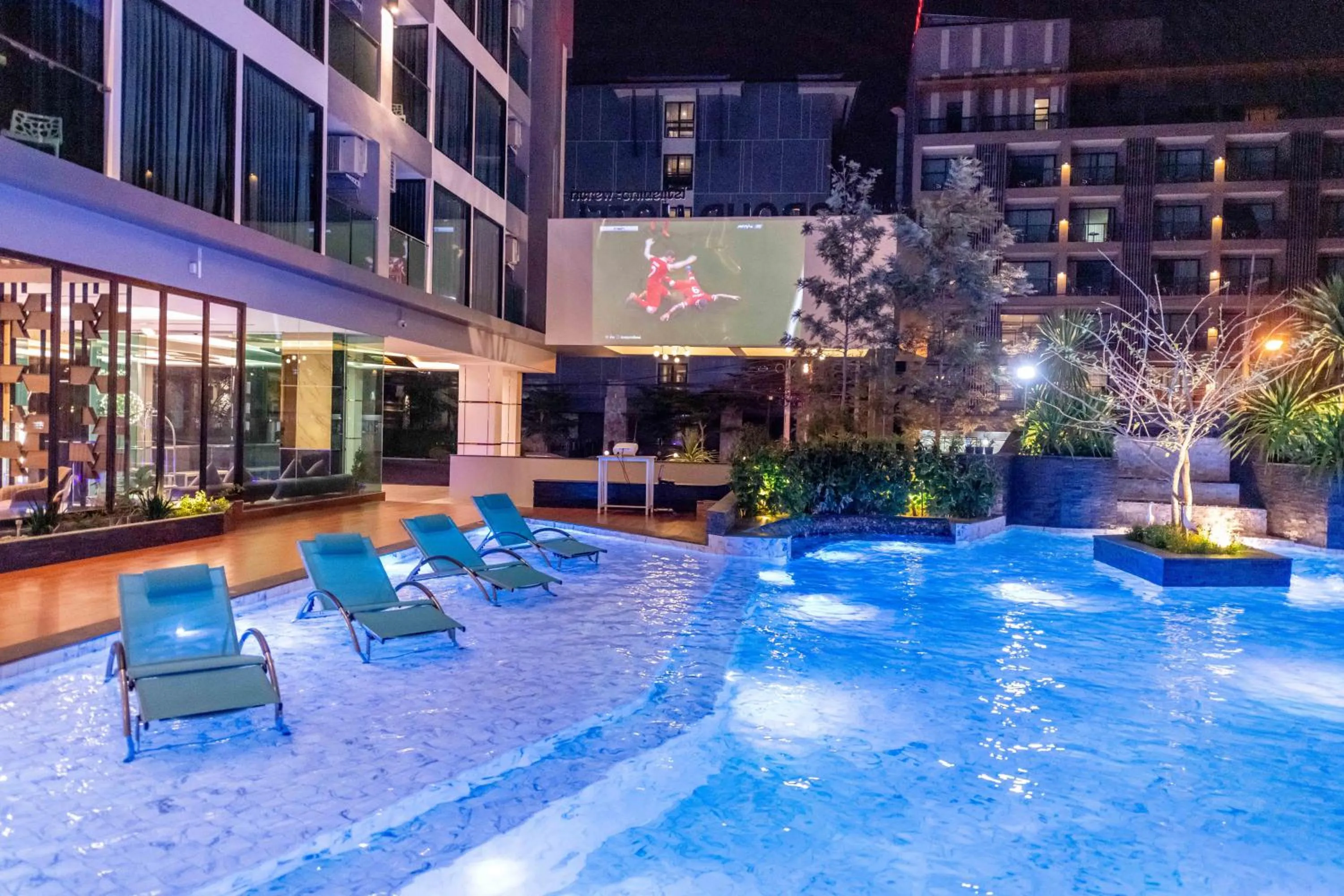 Swimming pool in The Proud Hotel Pattaya - SHA Certified