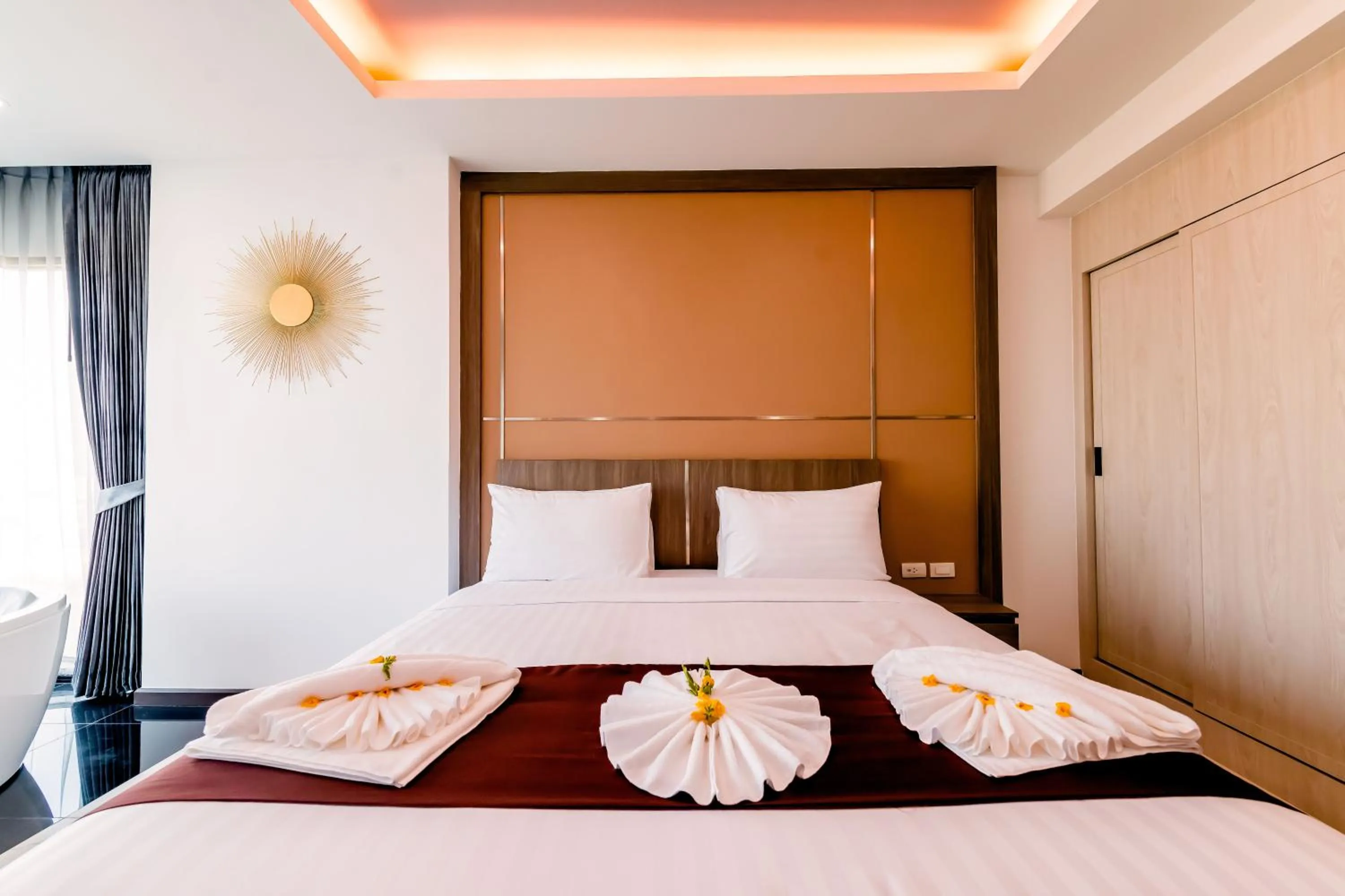 Bed in The Proud Hotel Pattaya - SHA Certified