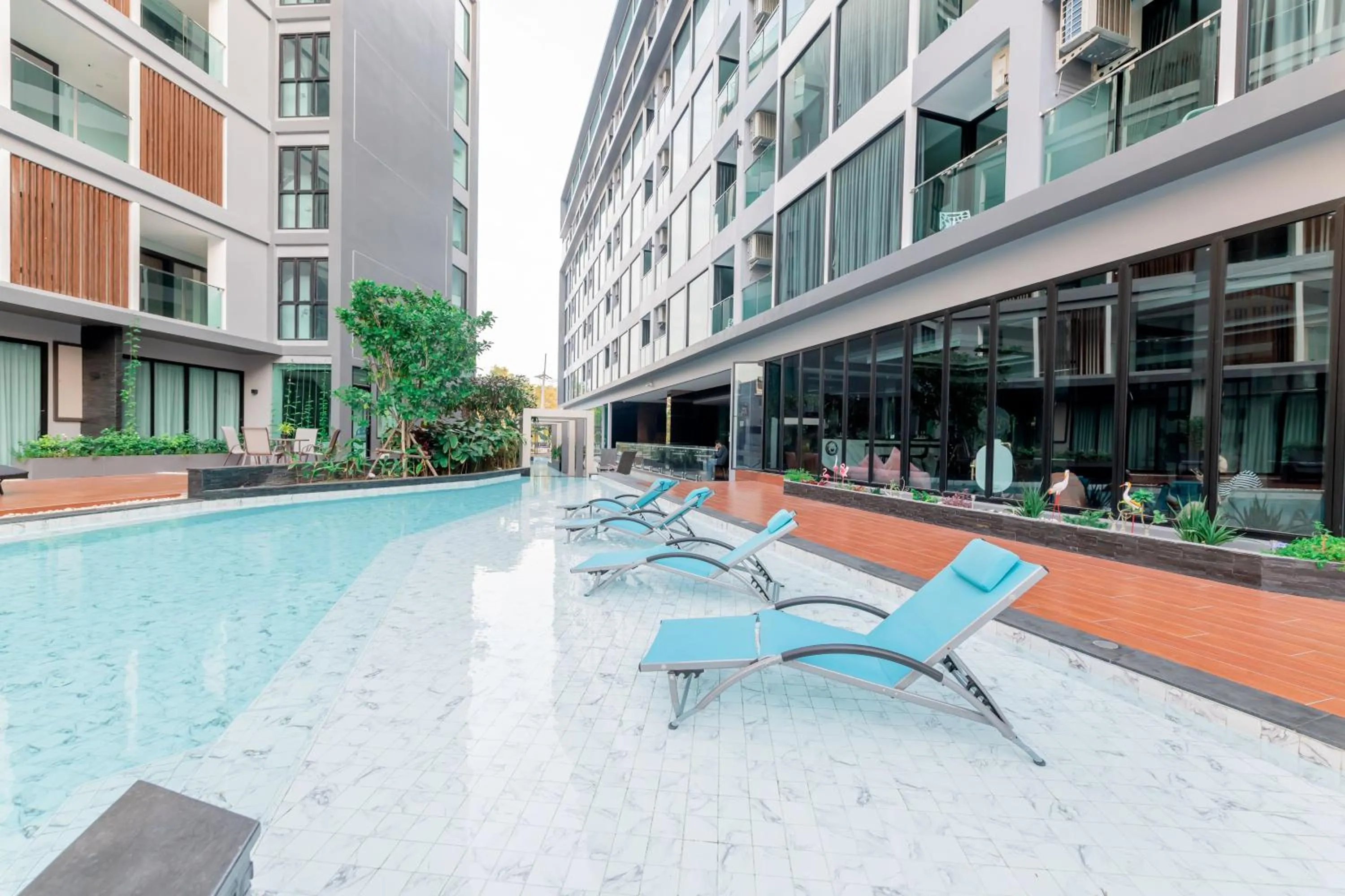 Swimming pool in The Proud Hotel Pattaya - SHA Certified