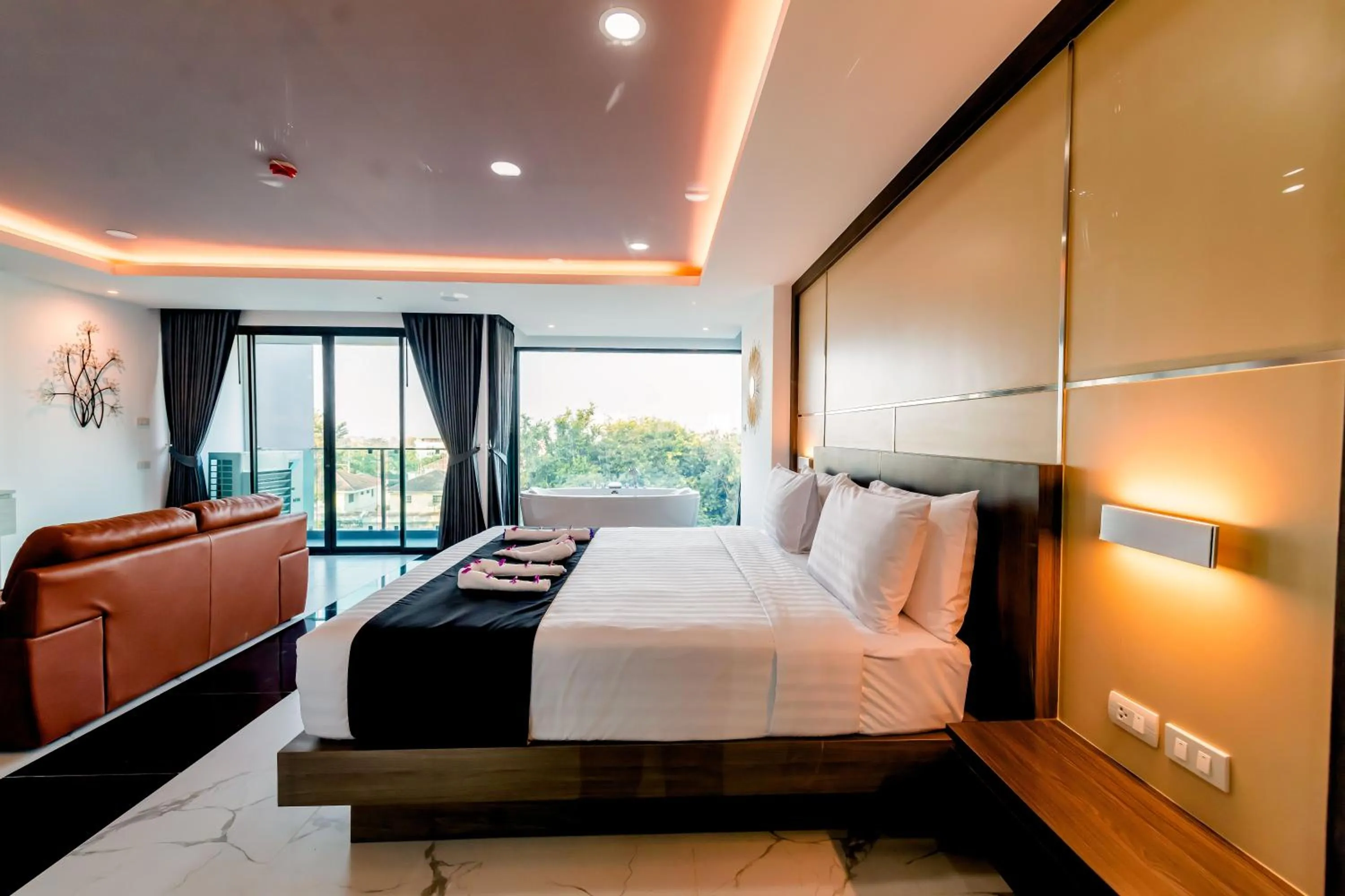 Bed in The Proud Hotel Pattaya - SHA Certified