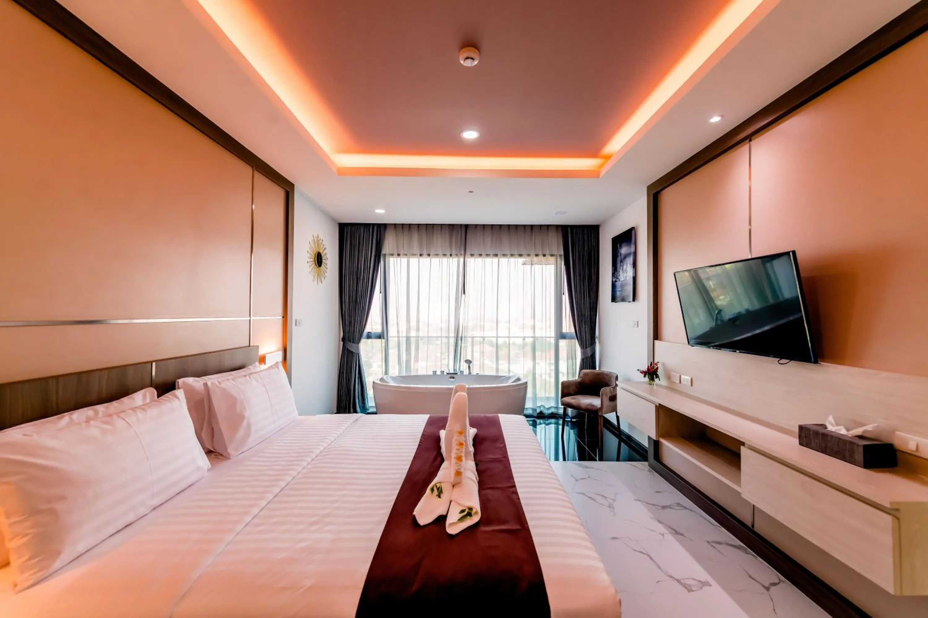 Bed in The Proud Hotel Pattaya - SHA Certified