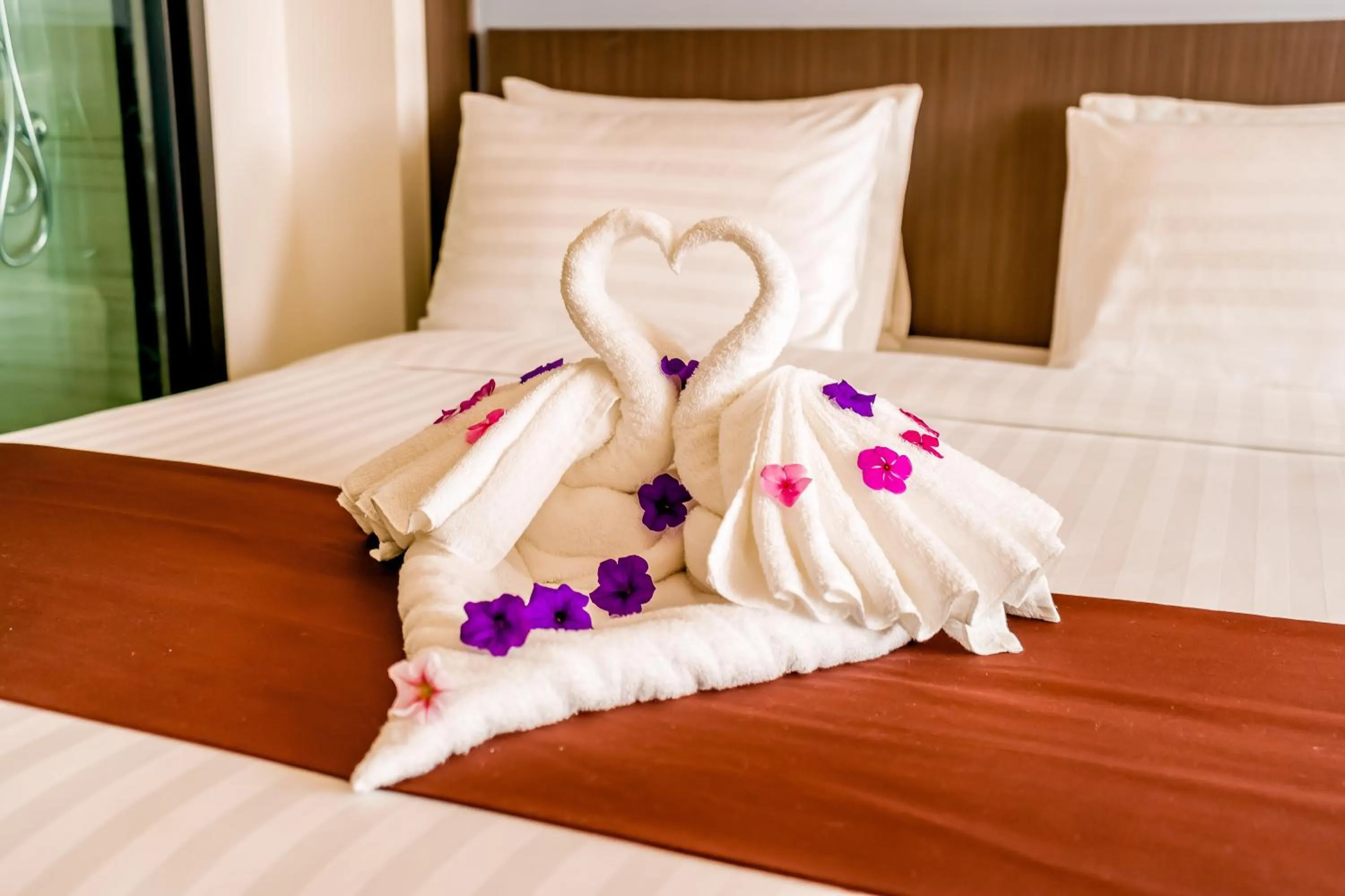 Bed in The Proud Hotel Pattaya - SHA Certified