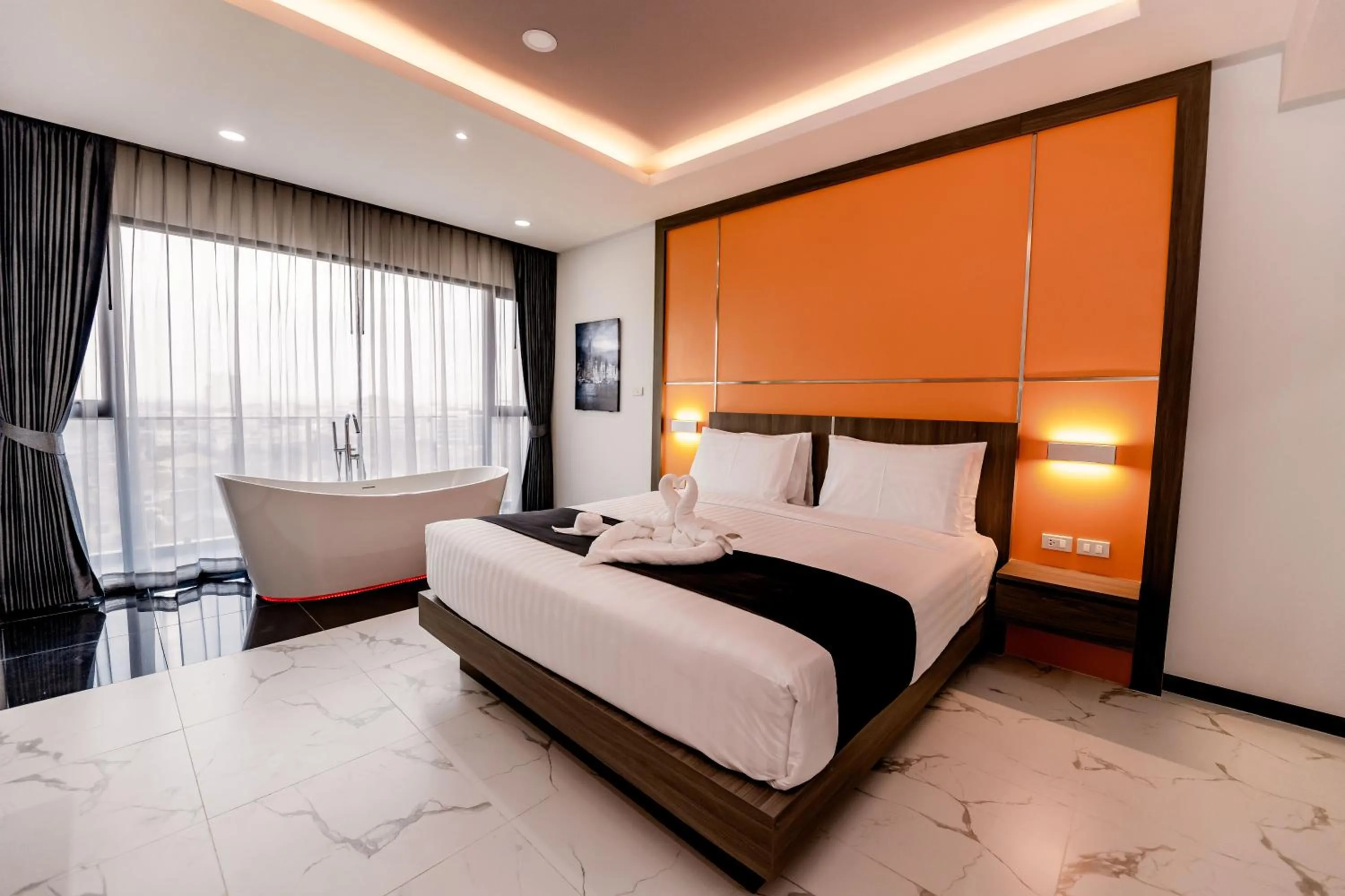 Bed in The Proud Hotel Pattaya - SHA Certified