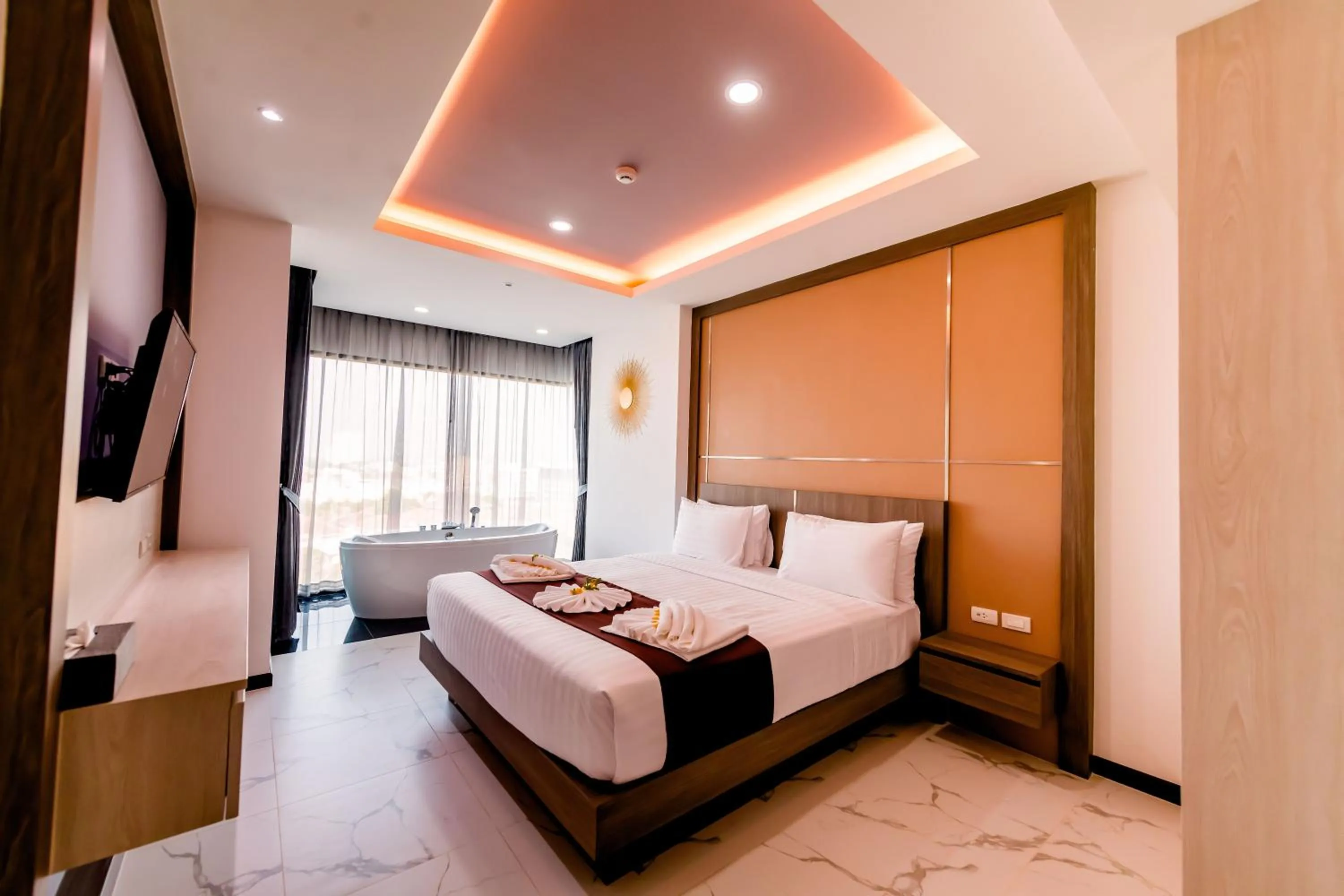 Bed in The Proud Hotel Pattaya - SHA Certified