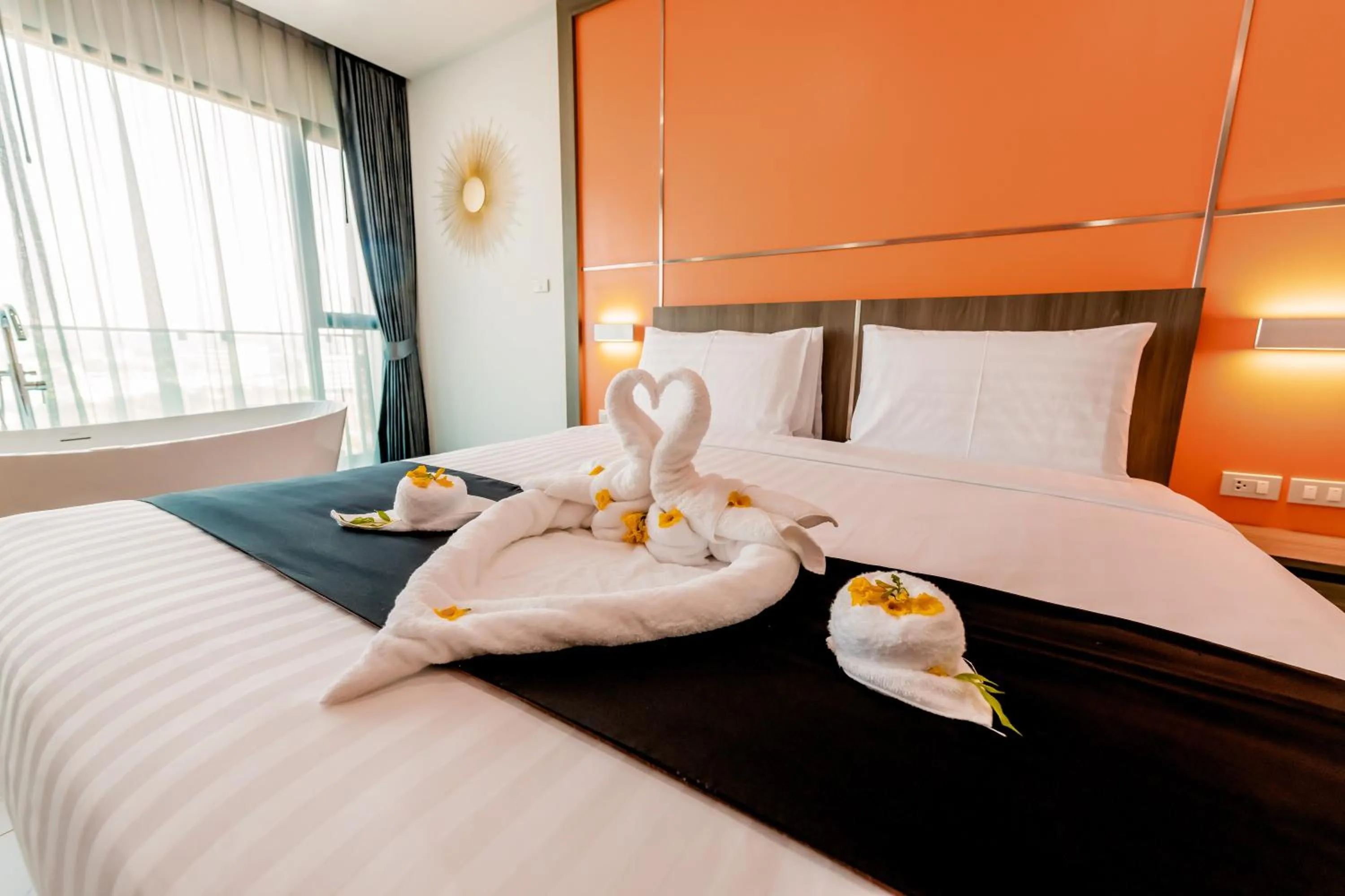 Bed in The Proud Hotel Pattaya - SHA Certified