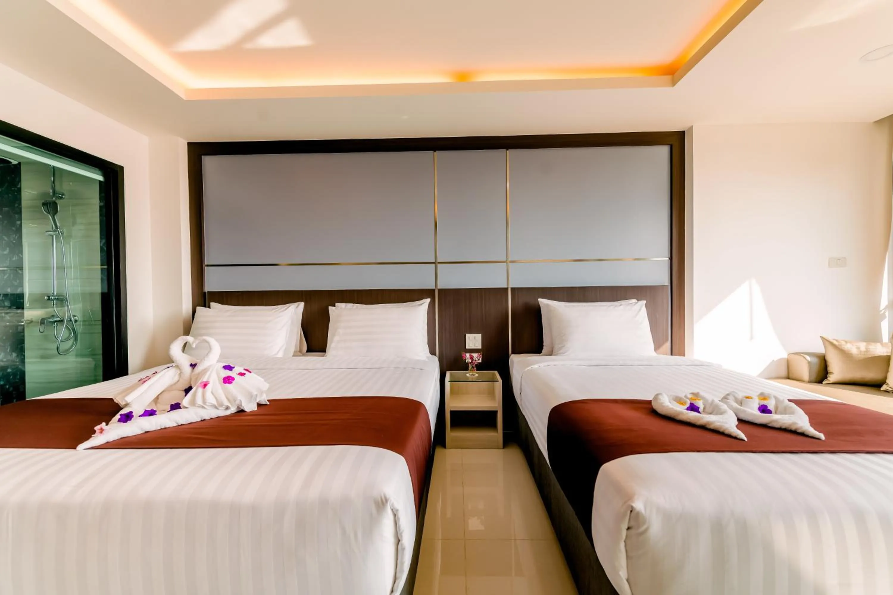 Bed in The Proud Hotel Pattaya - SHA Certified