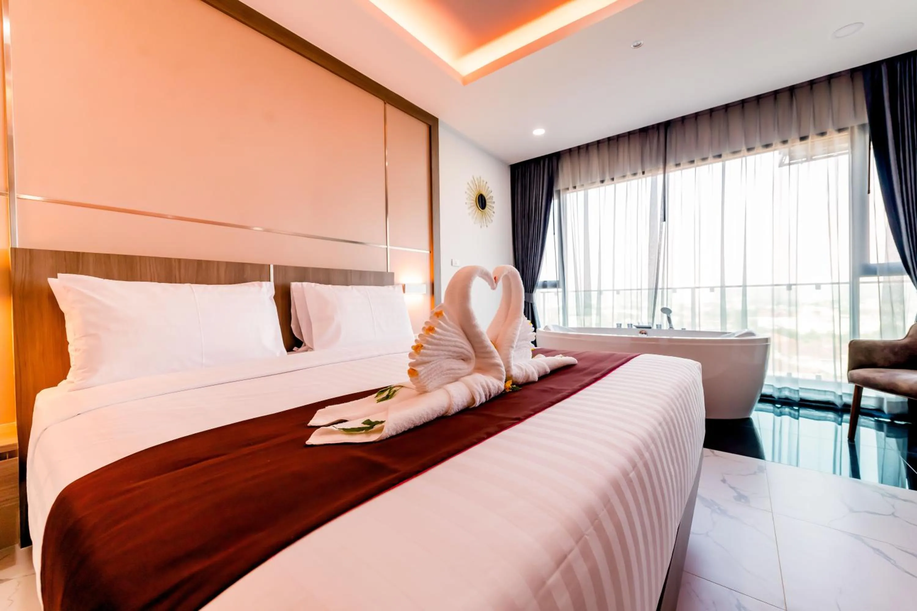 Bed in The Proud Hotel Pattaya - SHA Certified