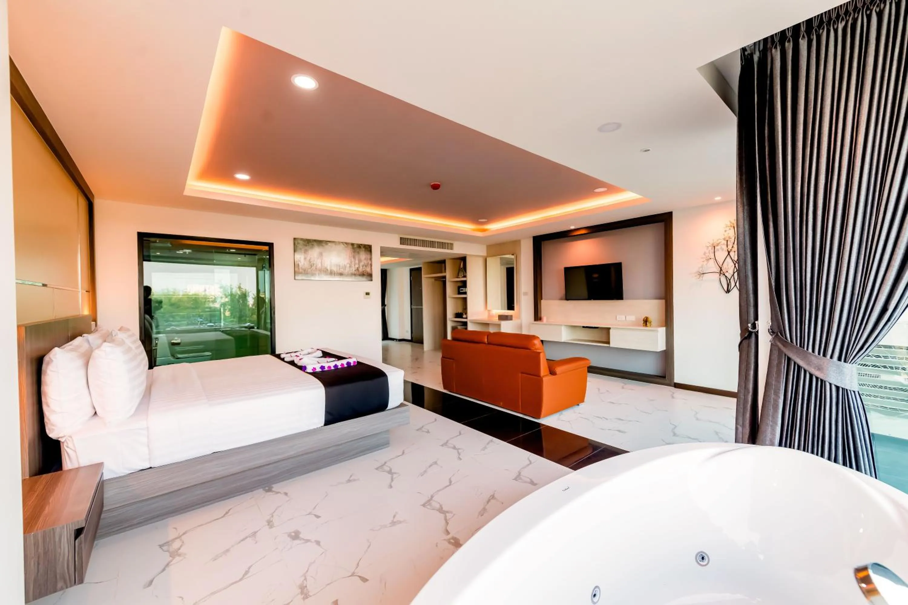 Bed in The Proud Hotel Pattaya - SHA Certified