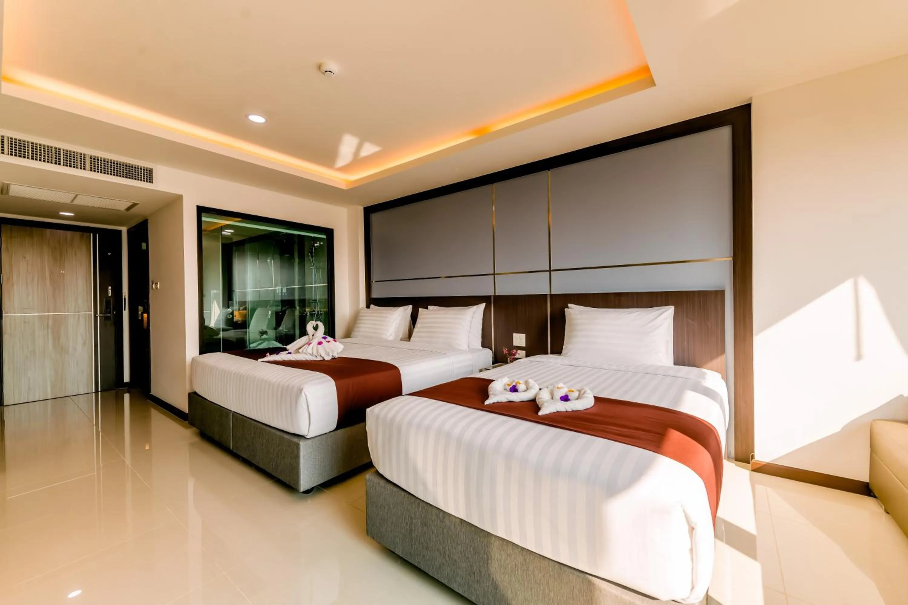 Bed in The Proud Hotel Pattaya - SHA Certified