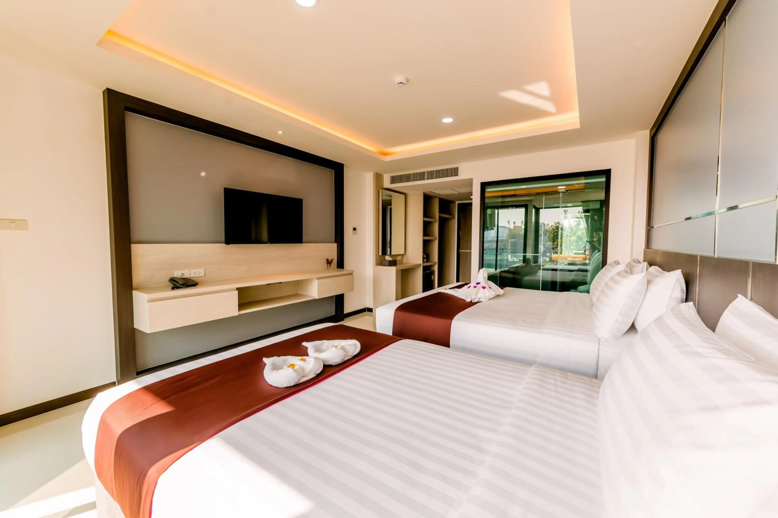 Bed in The Proud Hotel Pattaya - SHA Certified