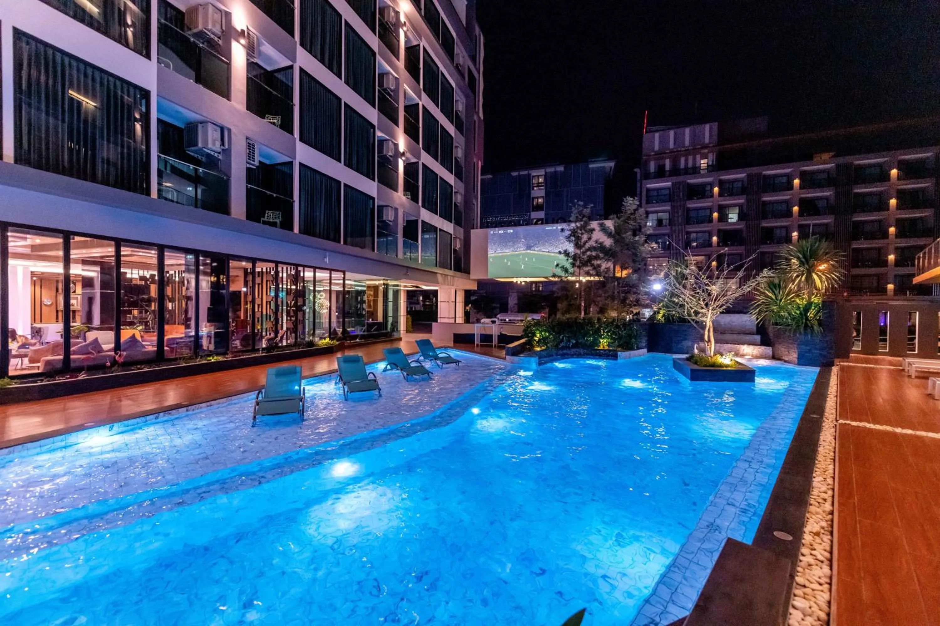 Swimming pool in The Proud Hotel Pattaya - SHA Certified