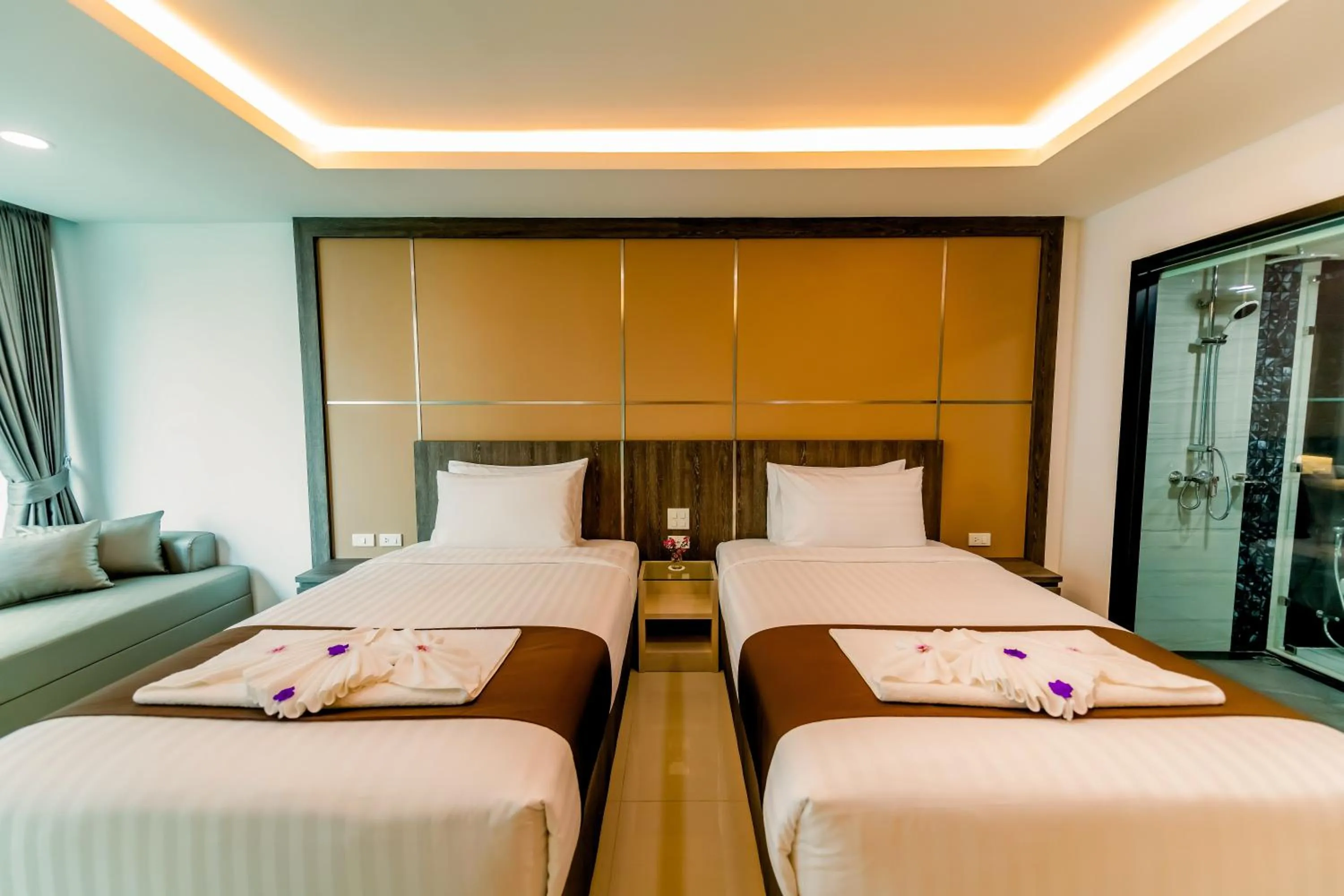 Bed in The Proud Hotel Pattaya - SHA Certified