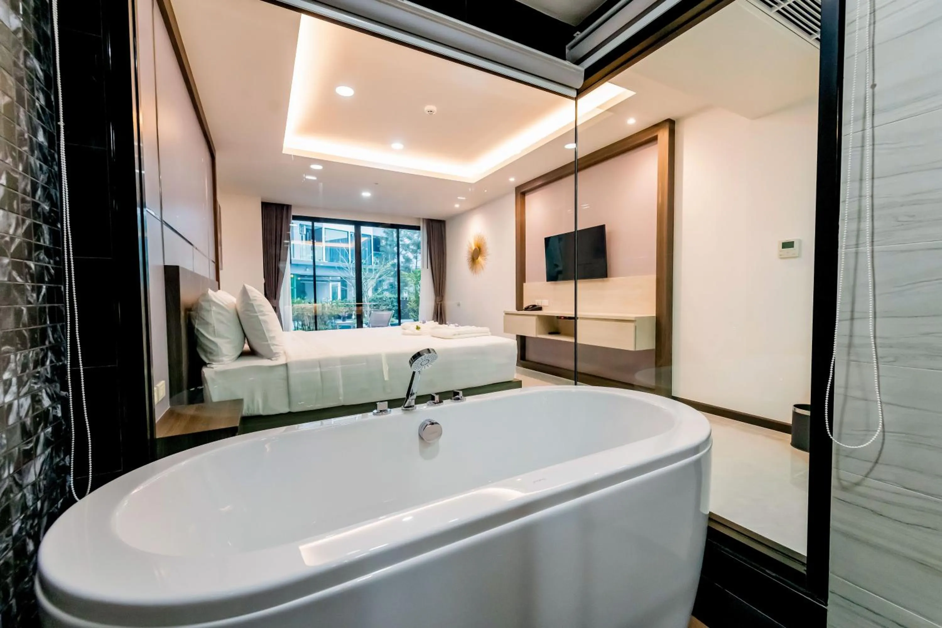 Bed in The Proud Hotel Pattaya - SHA Certified