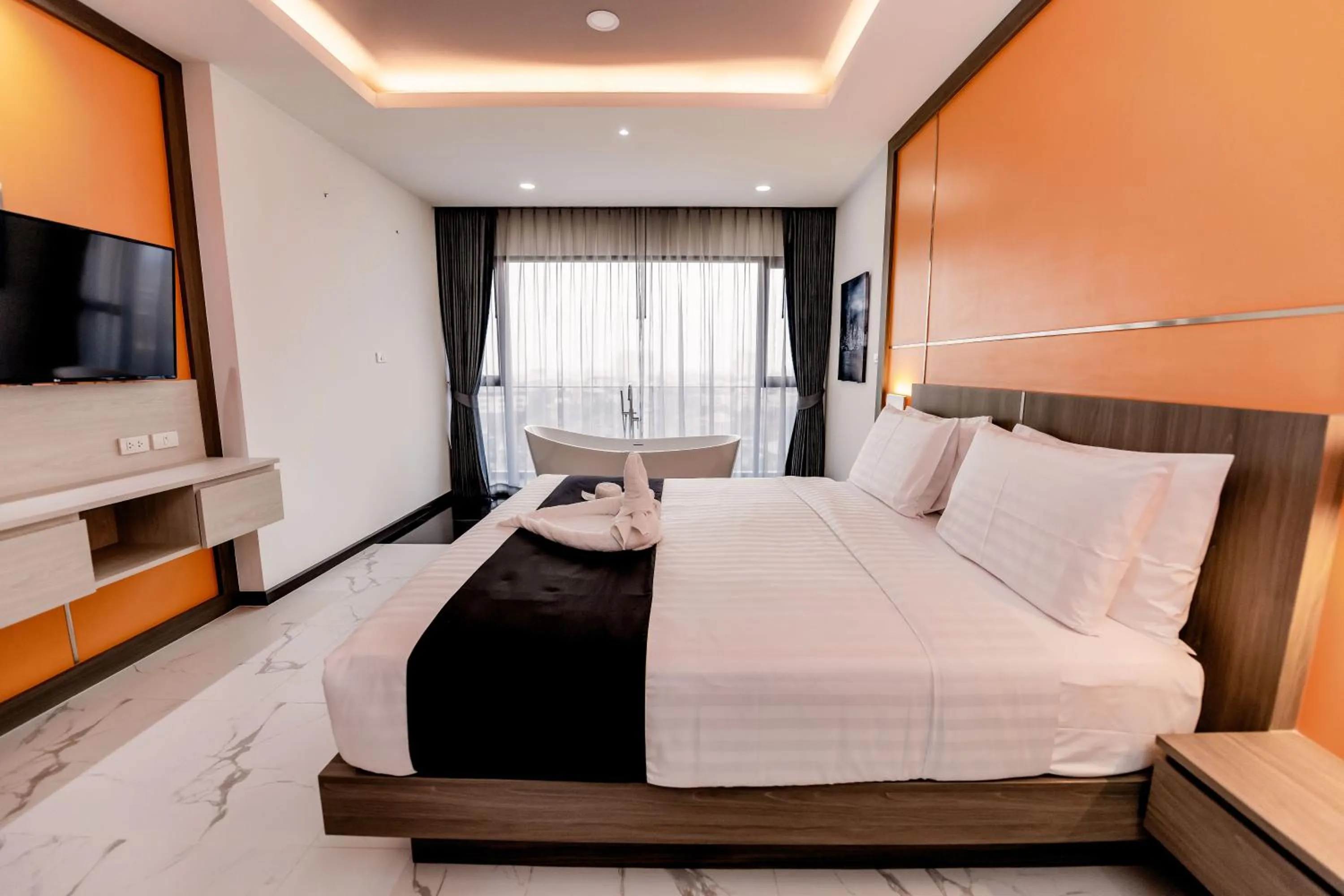 Bed in The Proud Hotel Pattaya - SHA Certified