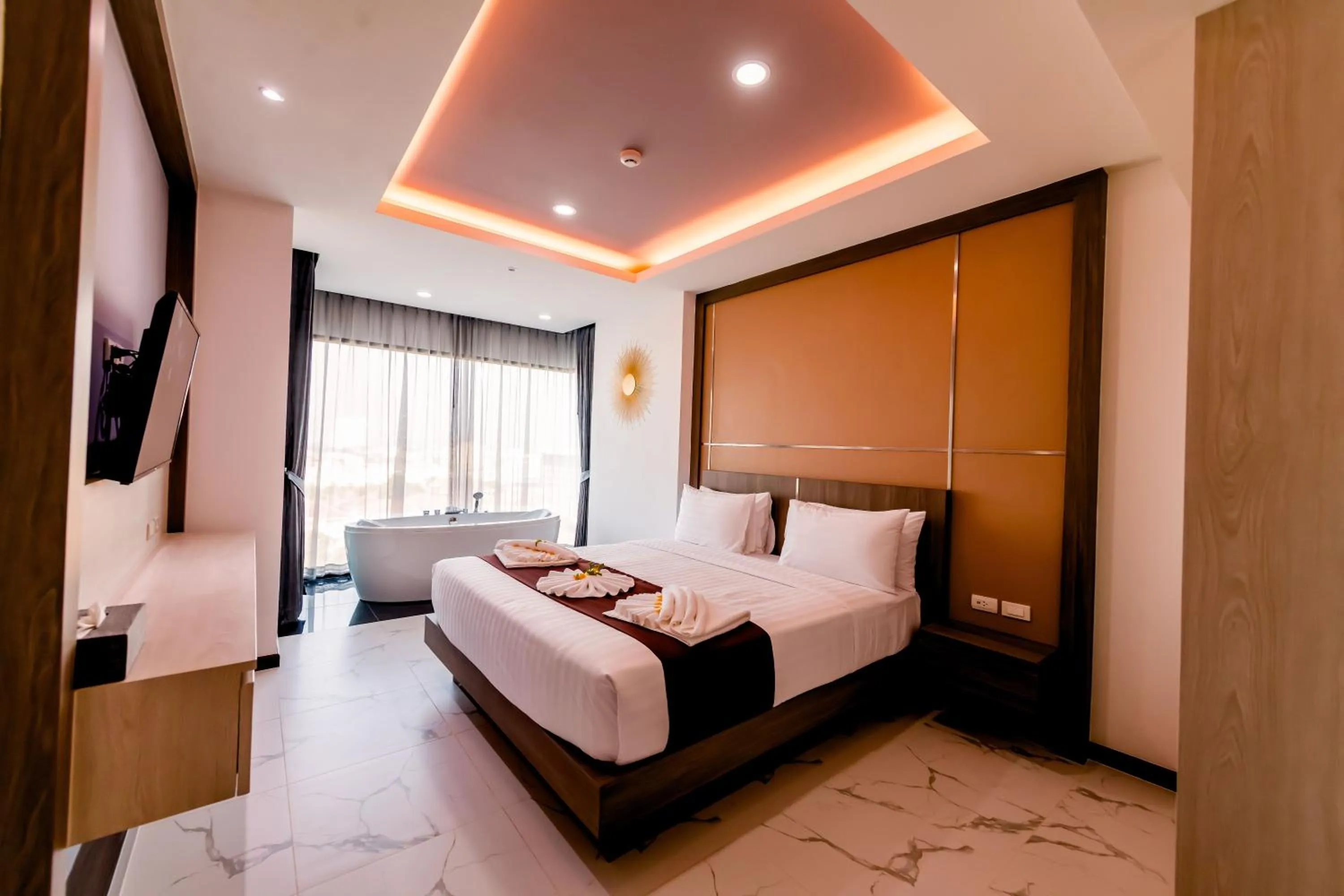 Bed in The Proud Hotel Pattaya - SHA Certified