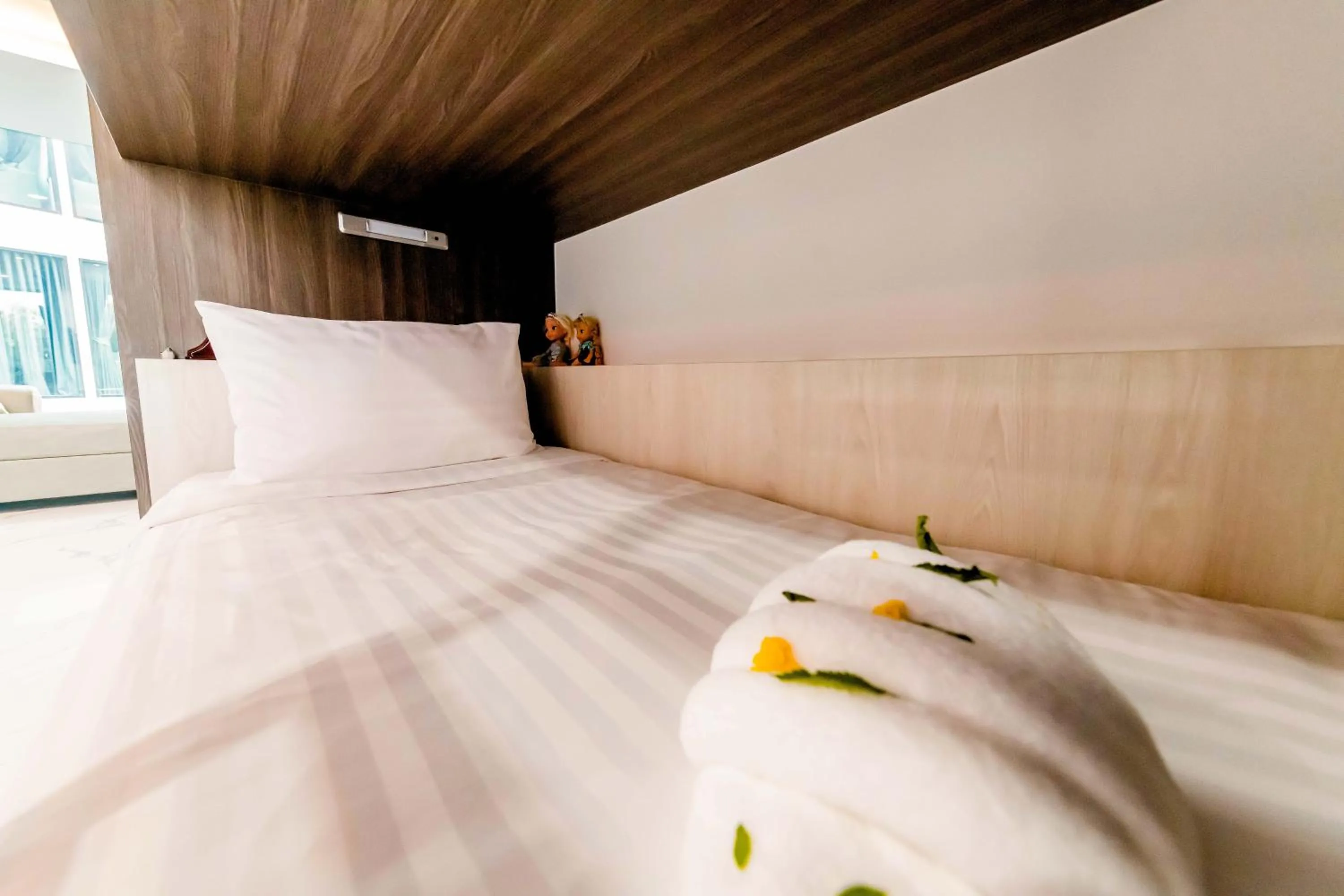 Bed in The Proud Hotel Pattaya - SHA Certified