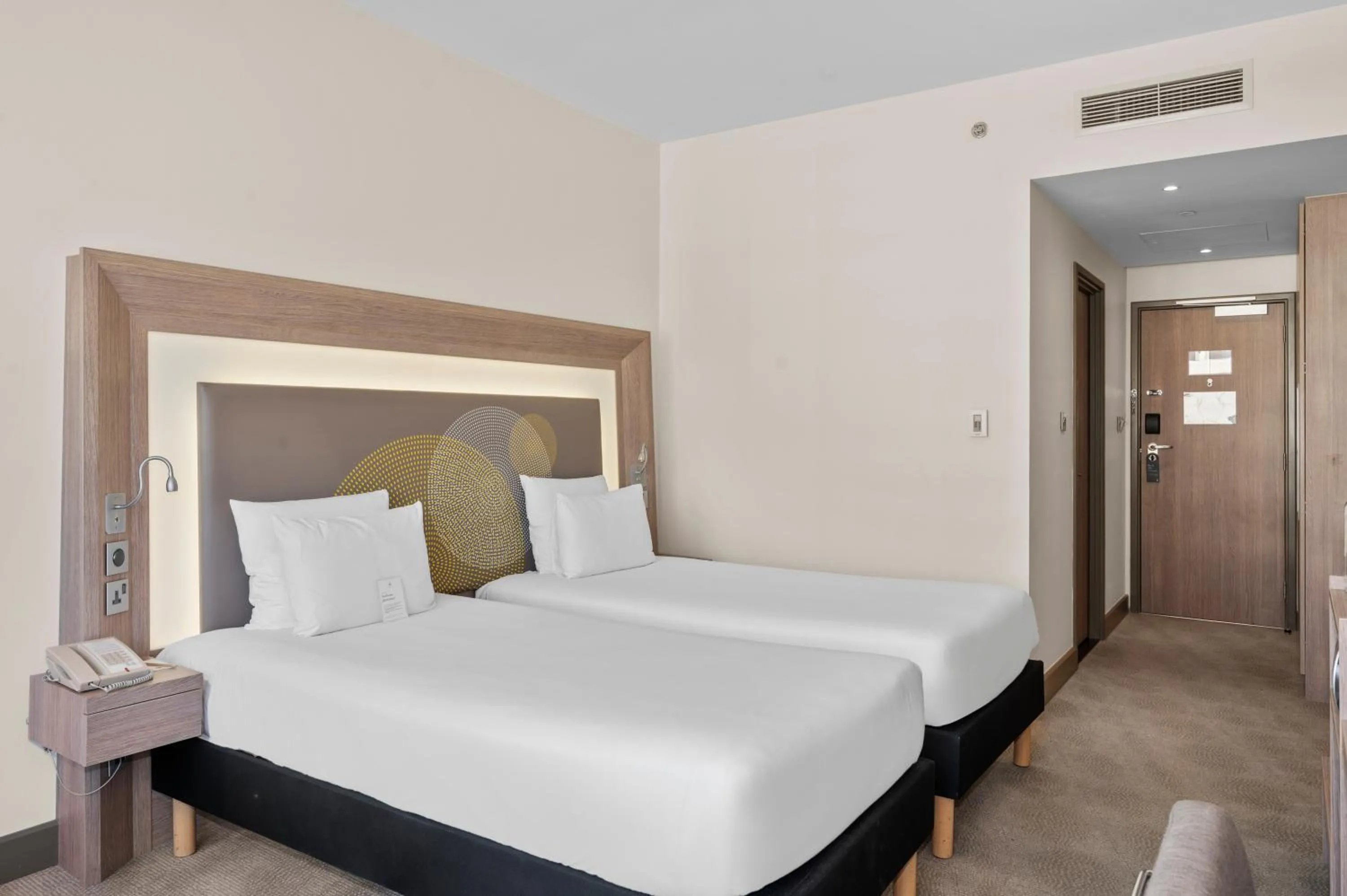 Bed in Novotel Dubai World Trade Centre