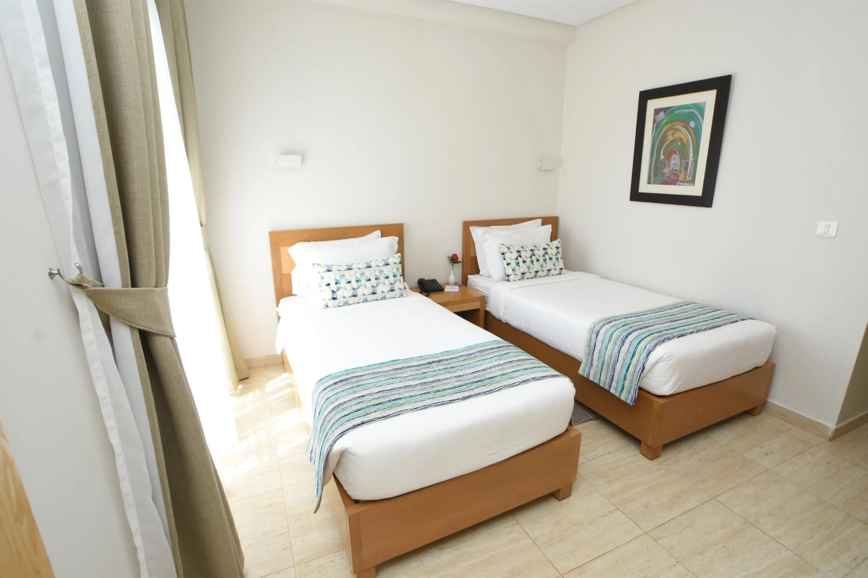 Bed in Downtown Tunis Hotel