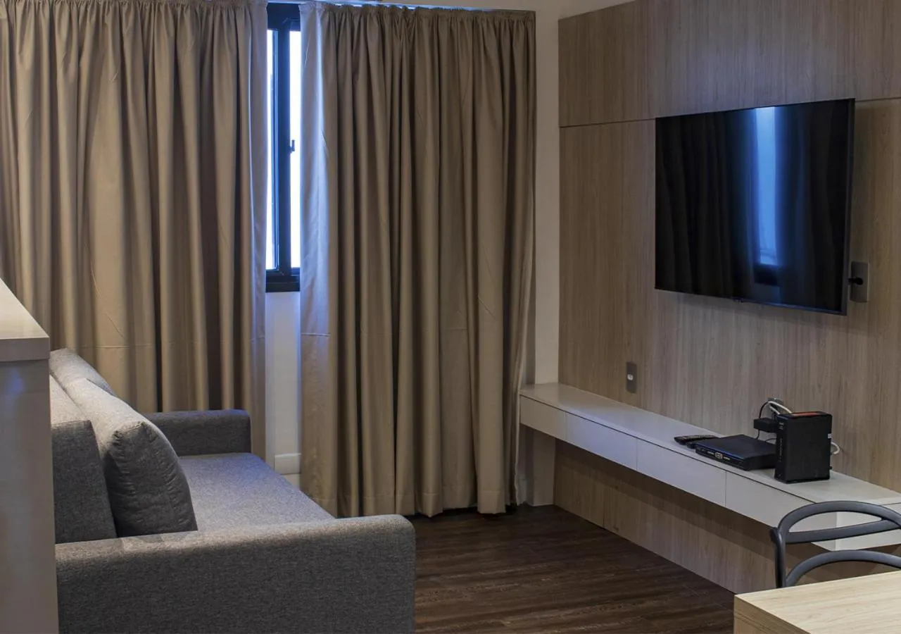 Communal lounge/ TV room in Anna Suites Ipanema by Arena Hotéis