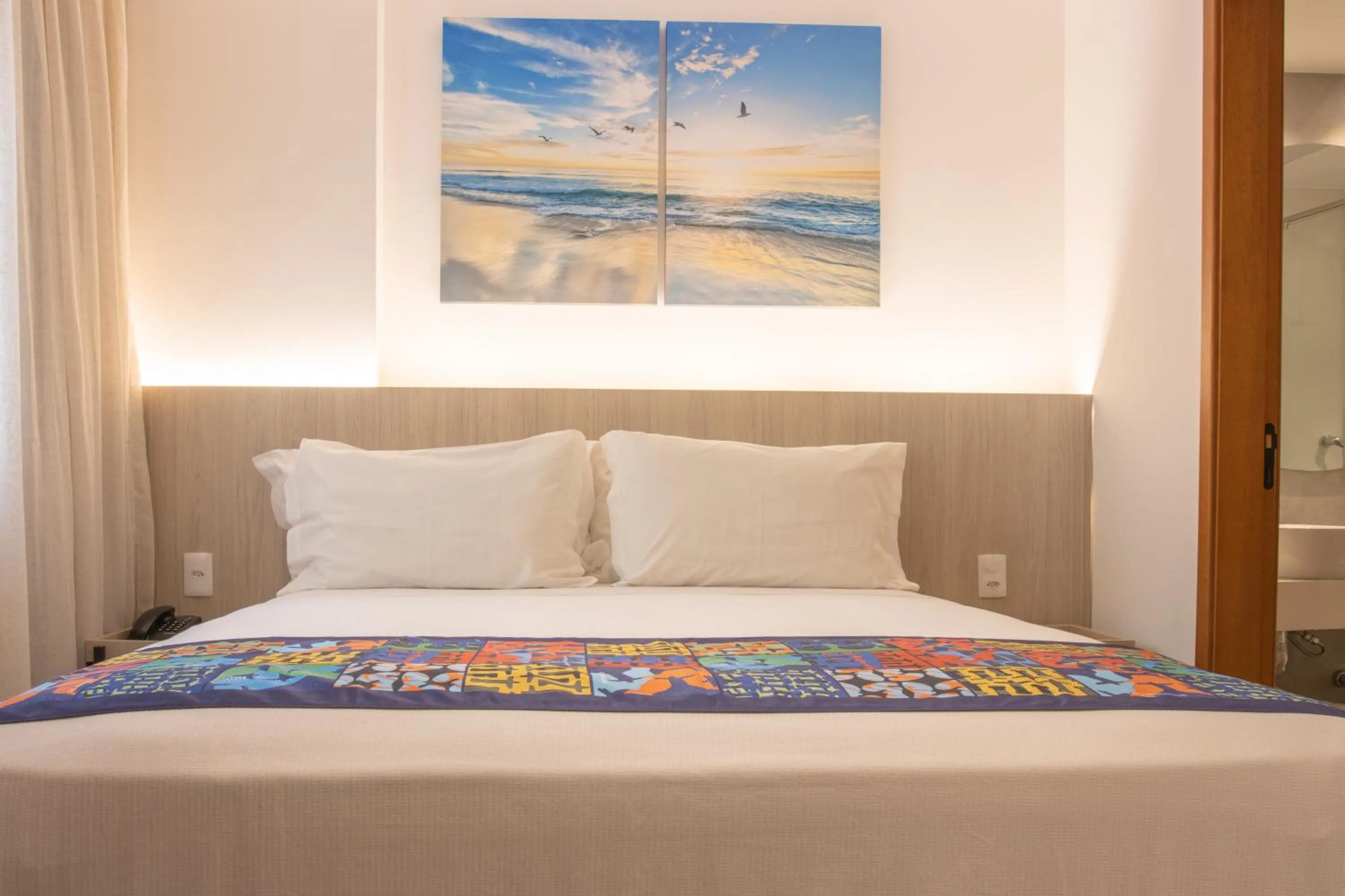 Bed in Anna Suites Ipanema by Arena Hotéis