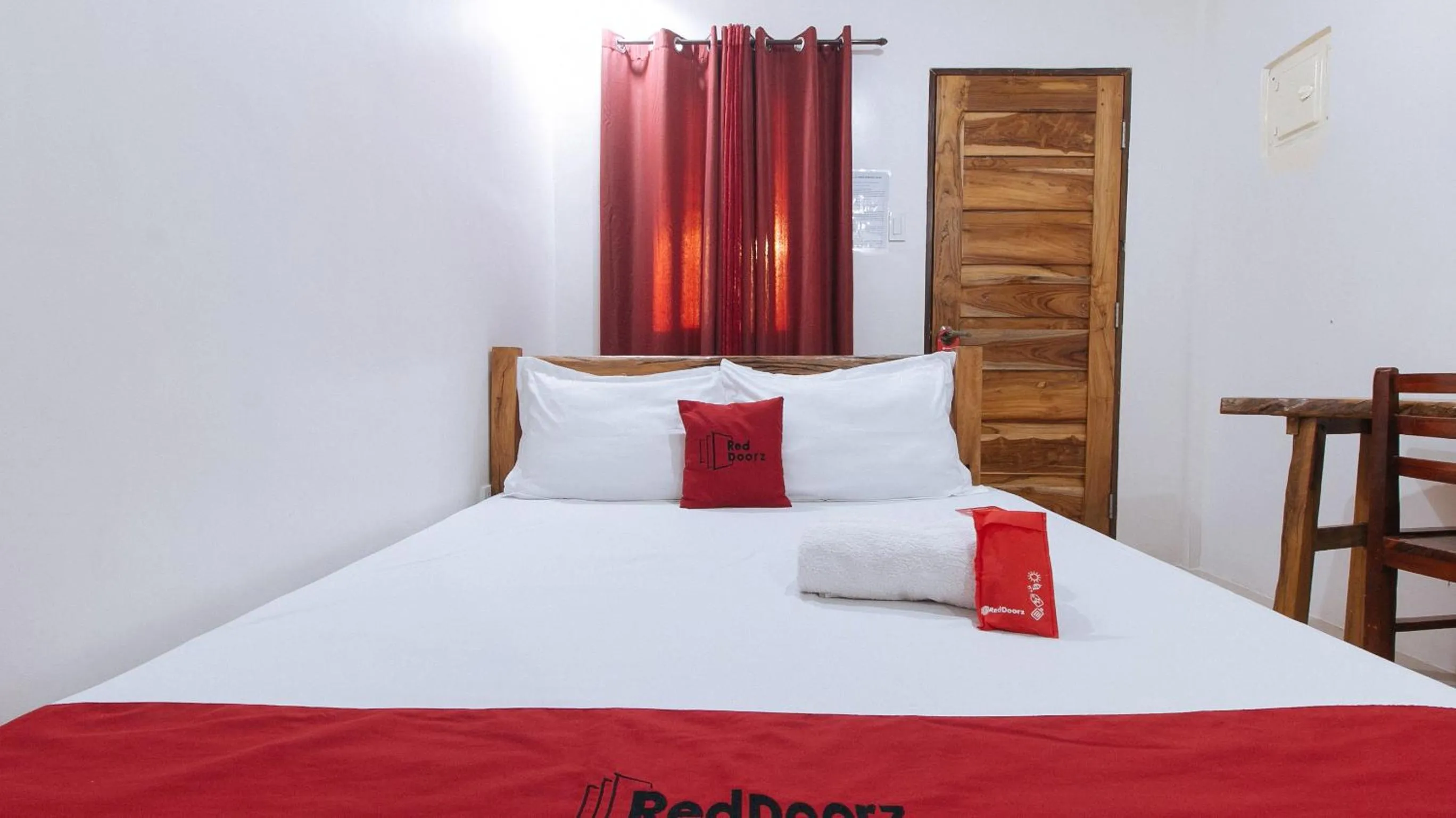 Photo of the whole room, Bed in RedDoorz Plus @ Jollydays Hotel Nueva Ecija