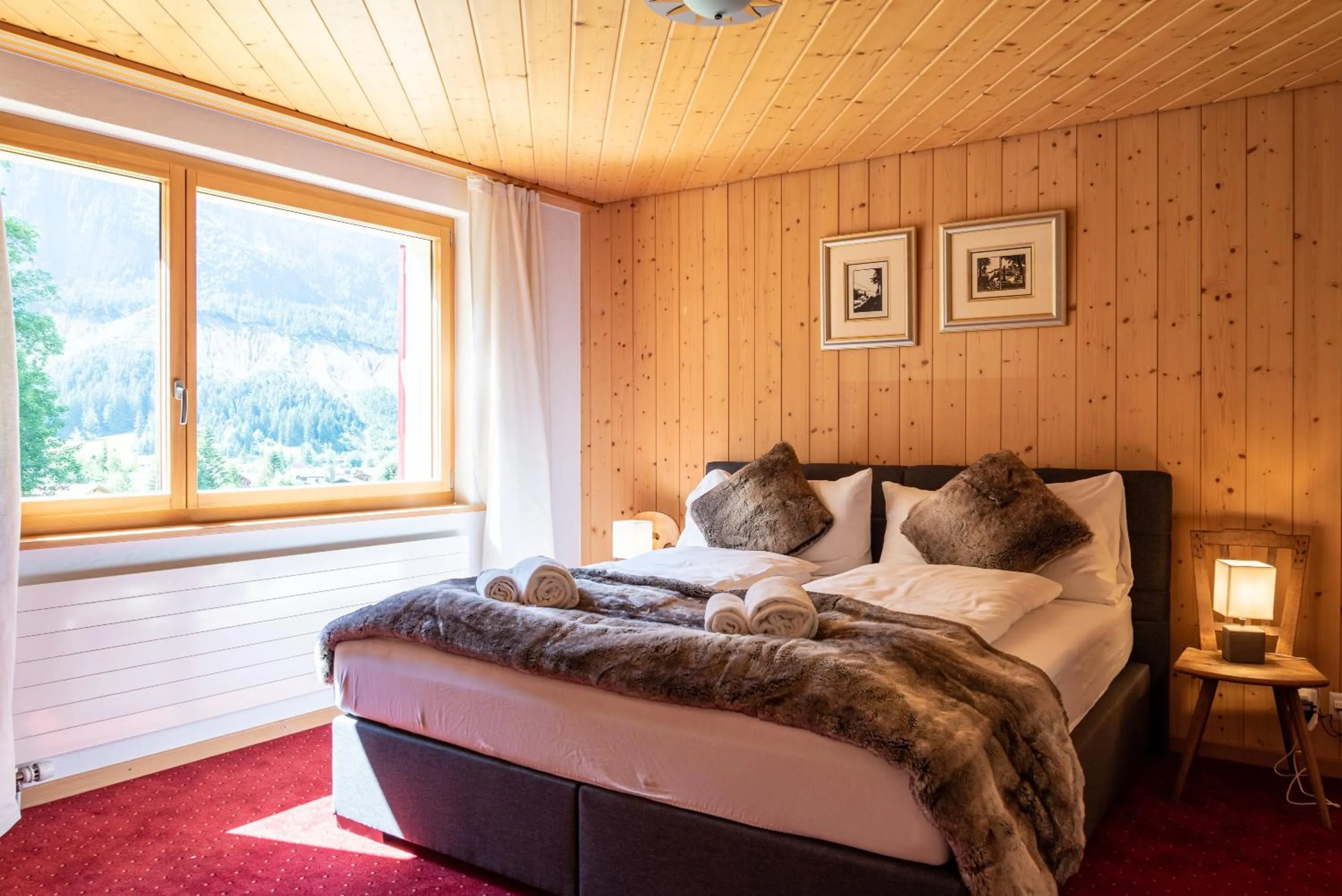 Bedroom, Bed in Typically Swiss Hotel Ermitage