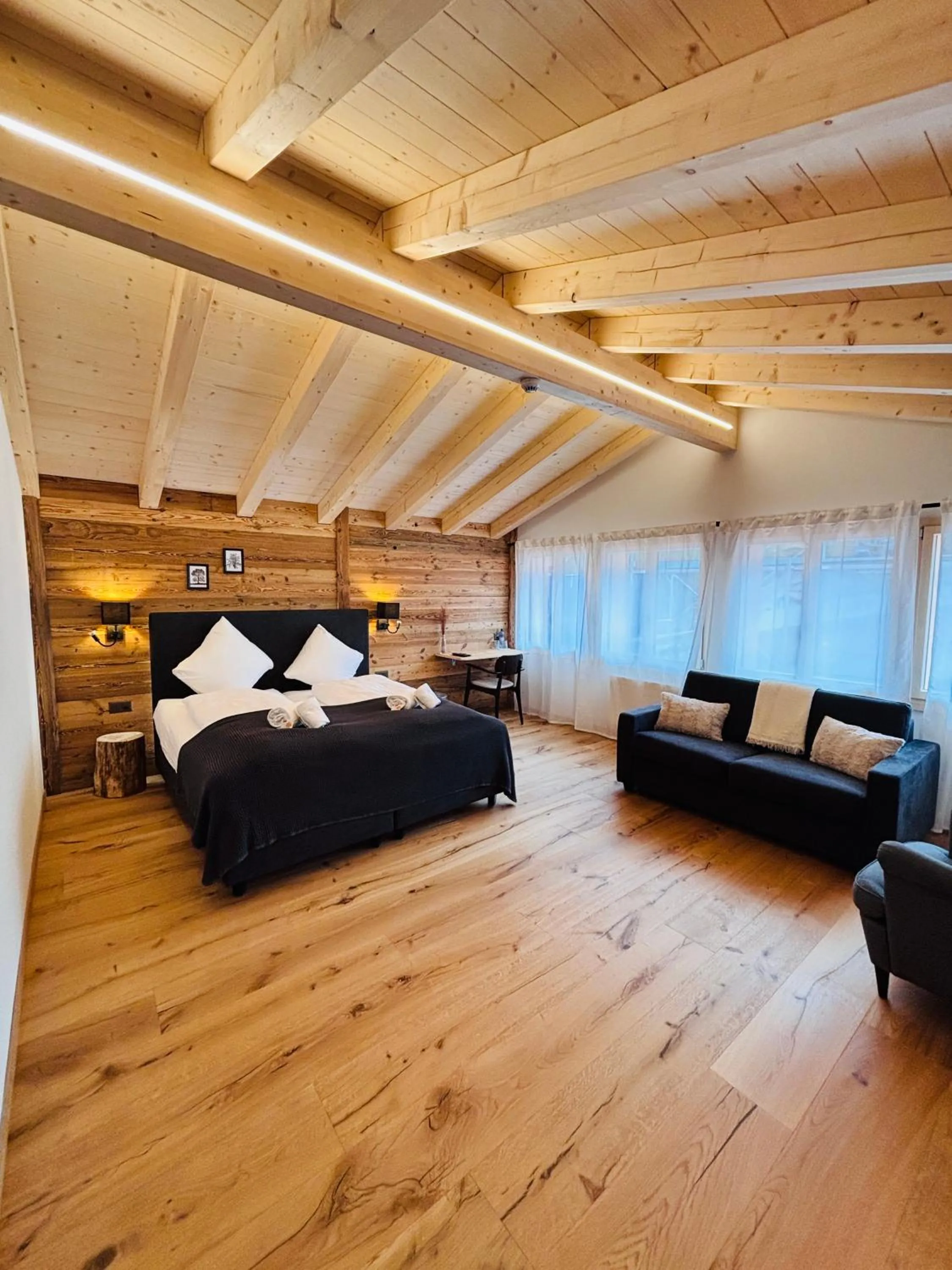 Bed in Typically Swiss Hotel Ermitage