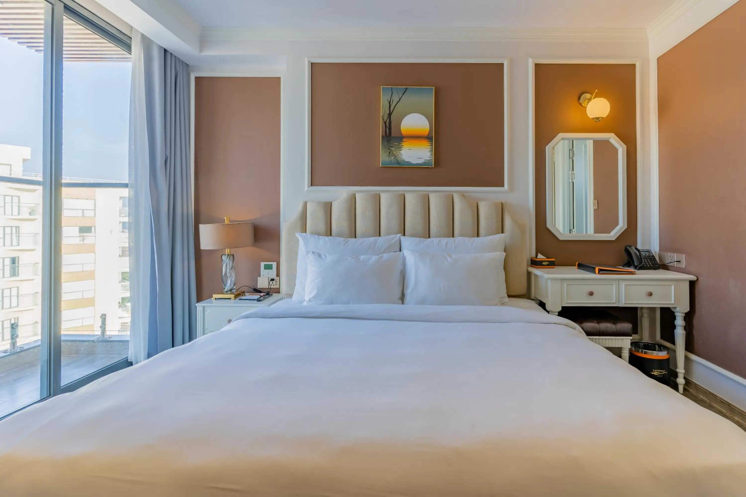 Bed in La Vague Hotel