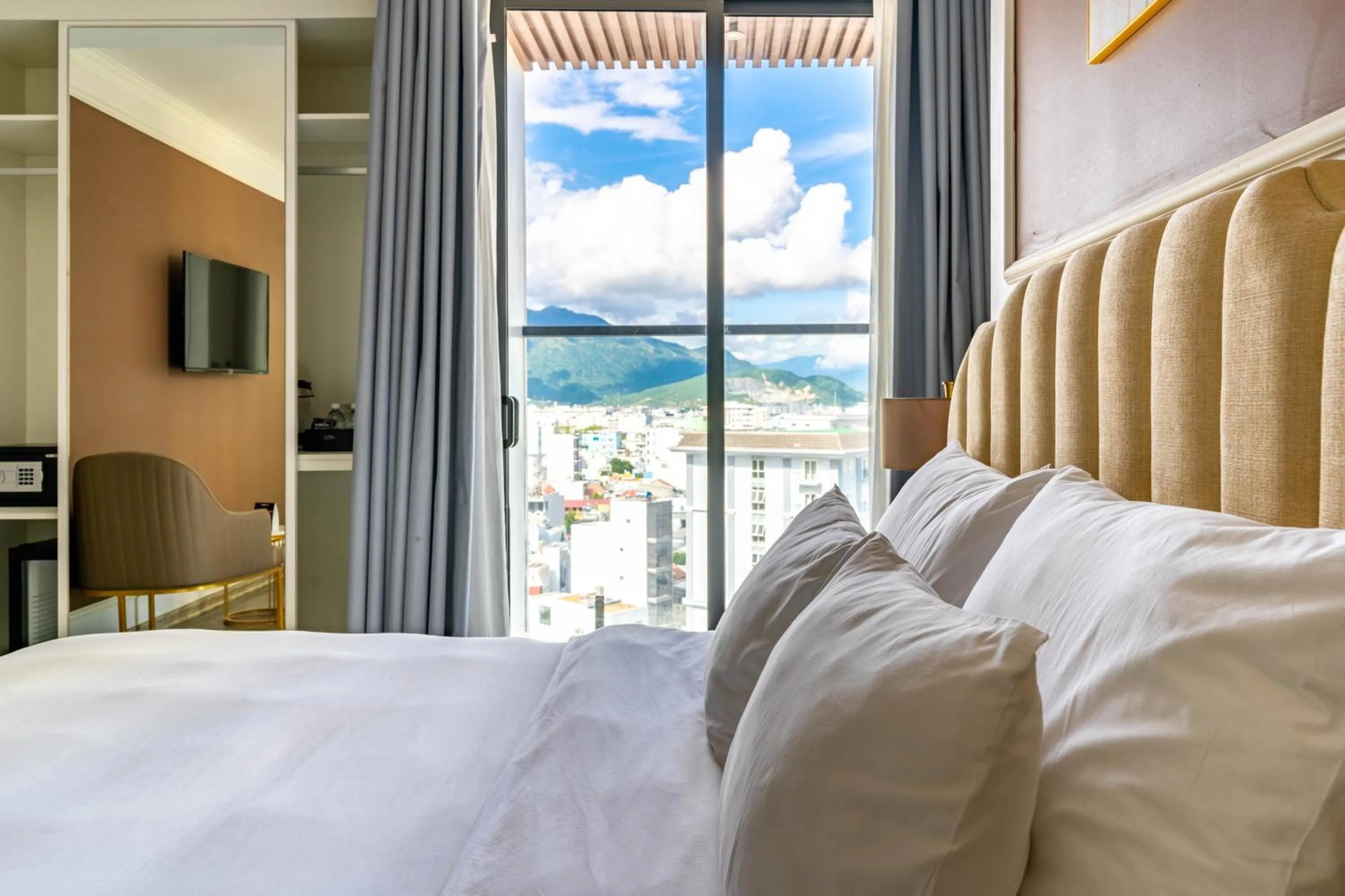 Bed in La Vague Hotel