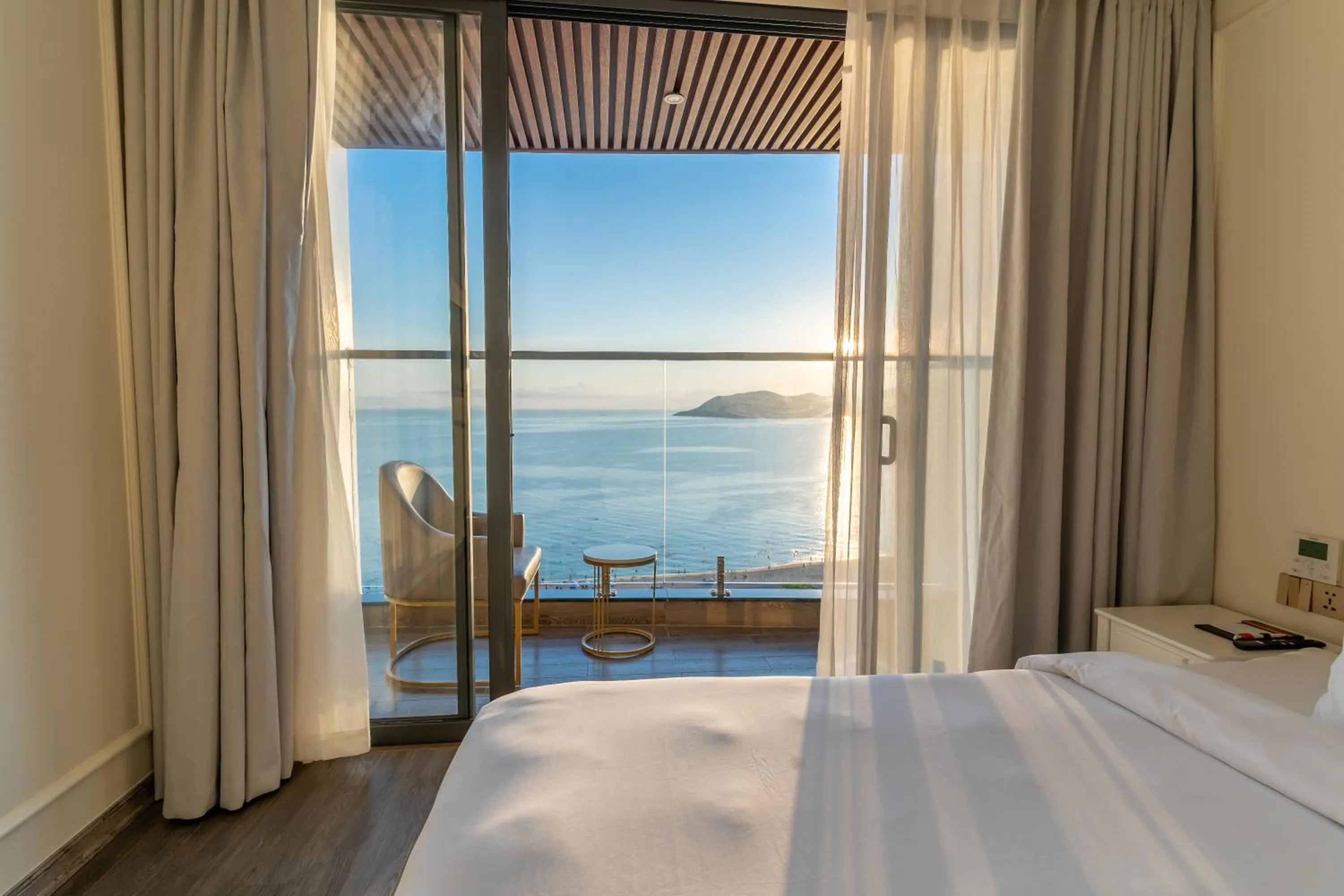 Bed in La Vague Hotel