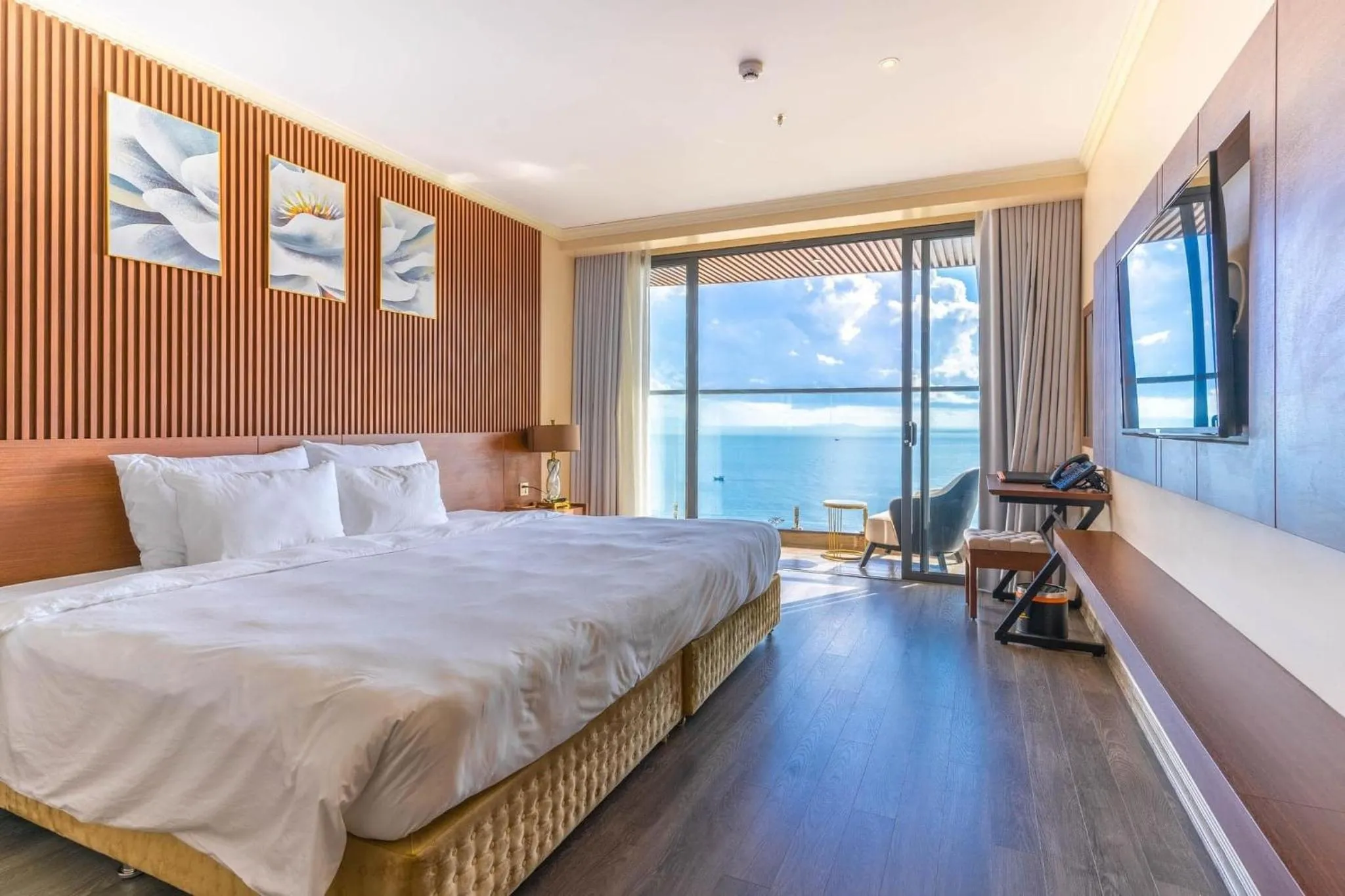 Bed in La Vague Hotel