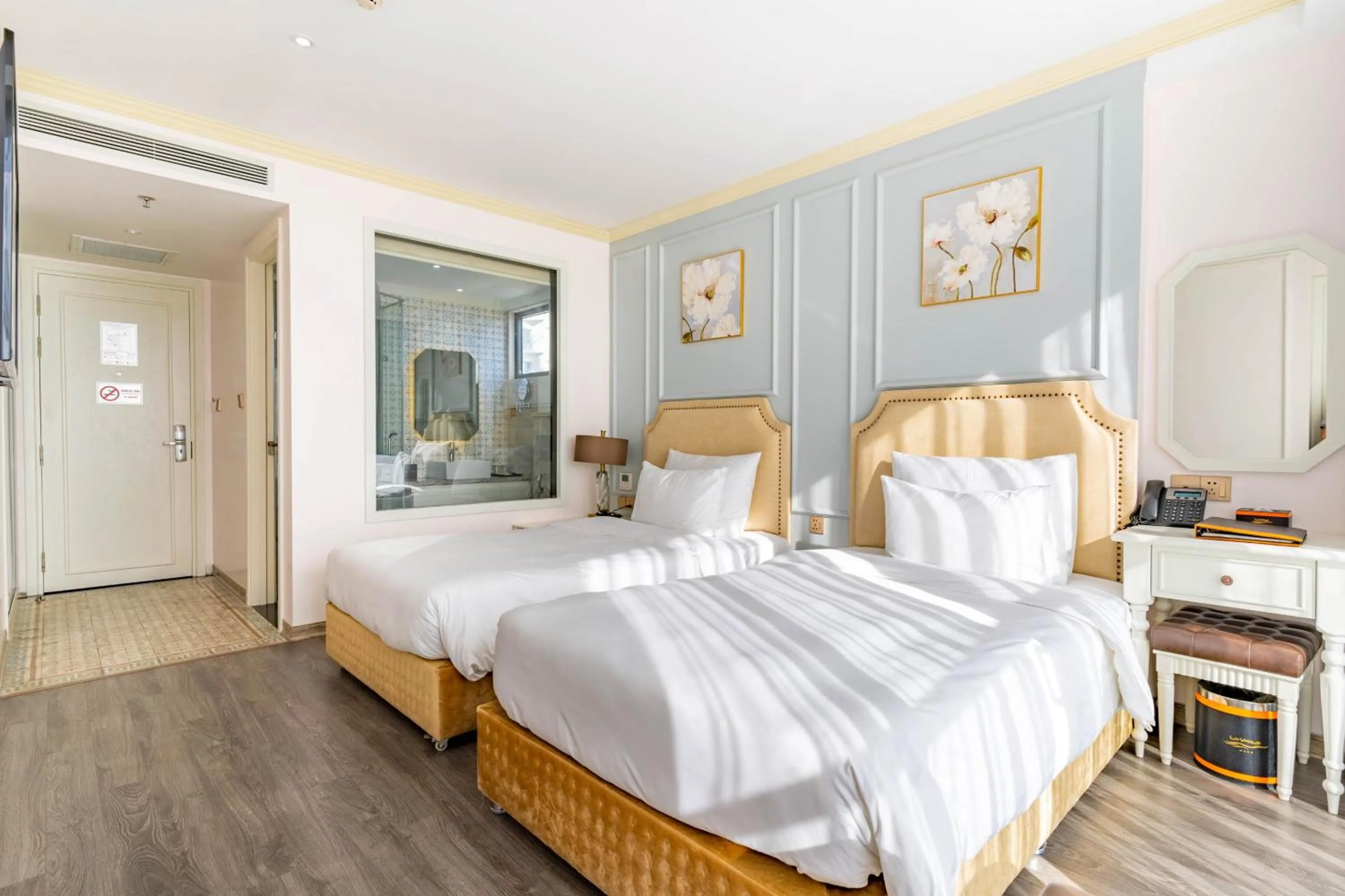 Bed in La Vague Hotel