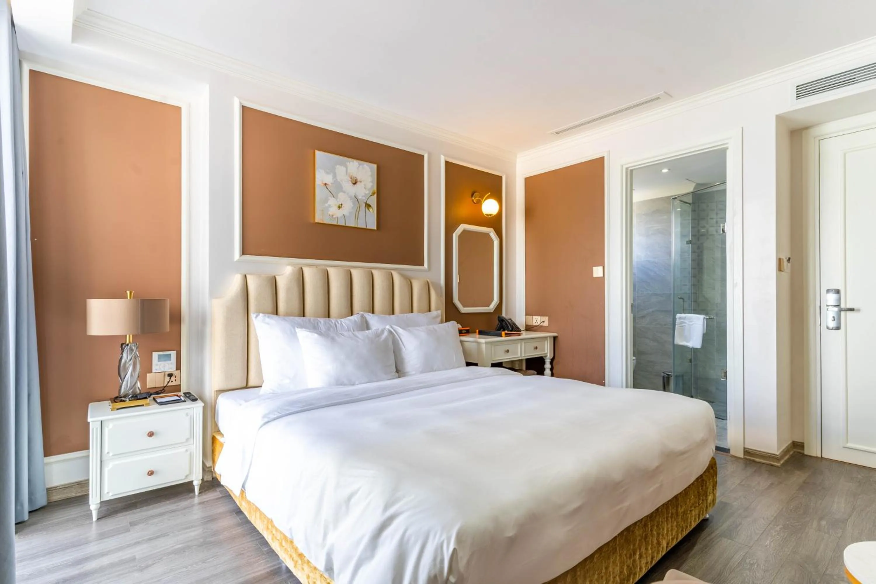 Bed in La Vague Hotel