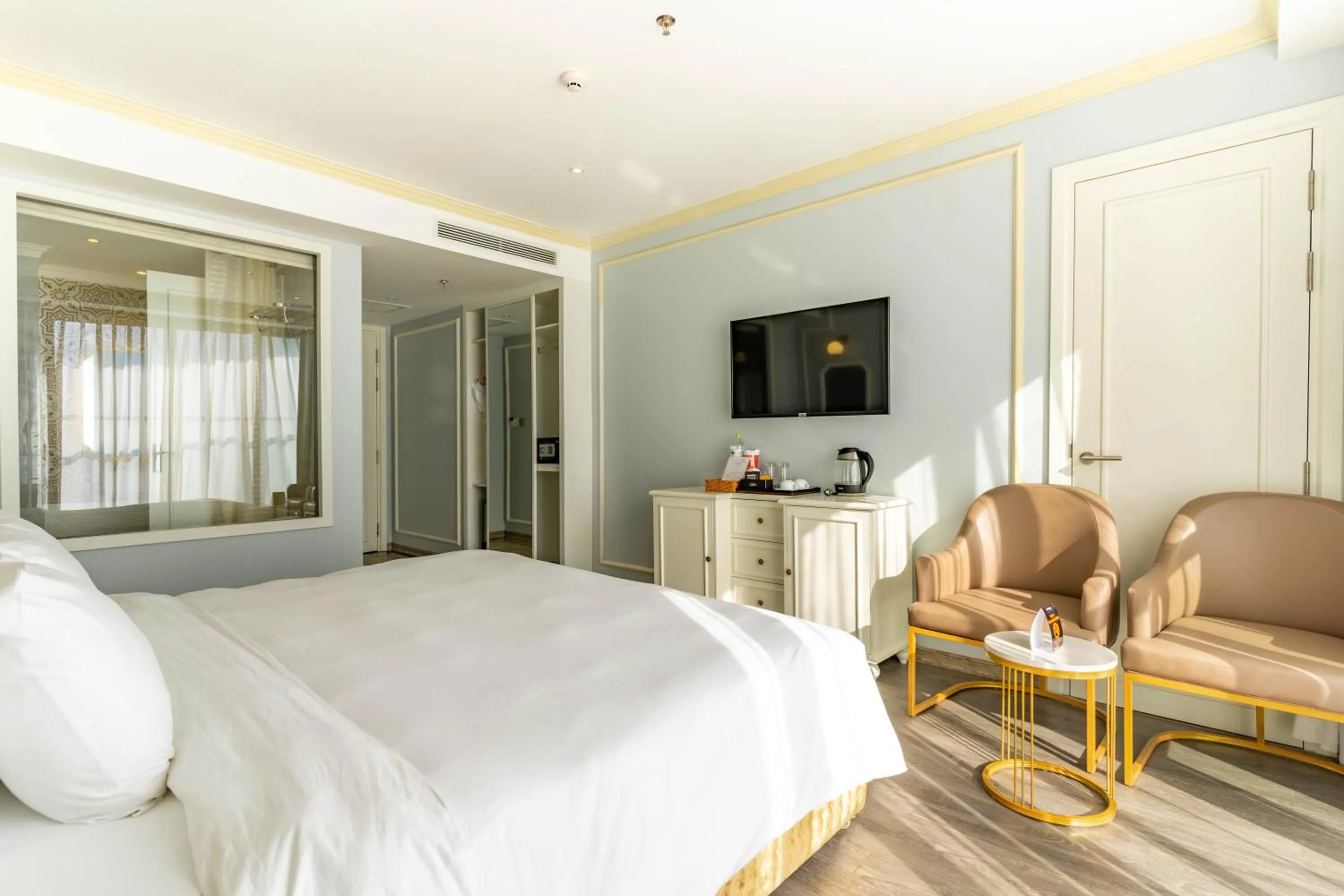 Bed in La Vague Hotel