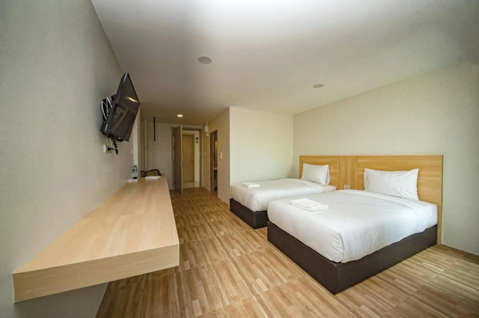Bed in The charlotte smart hotel lopburi