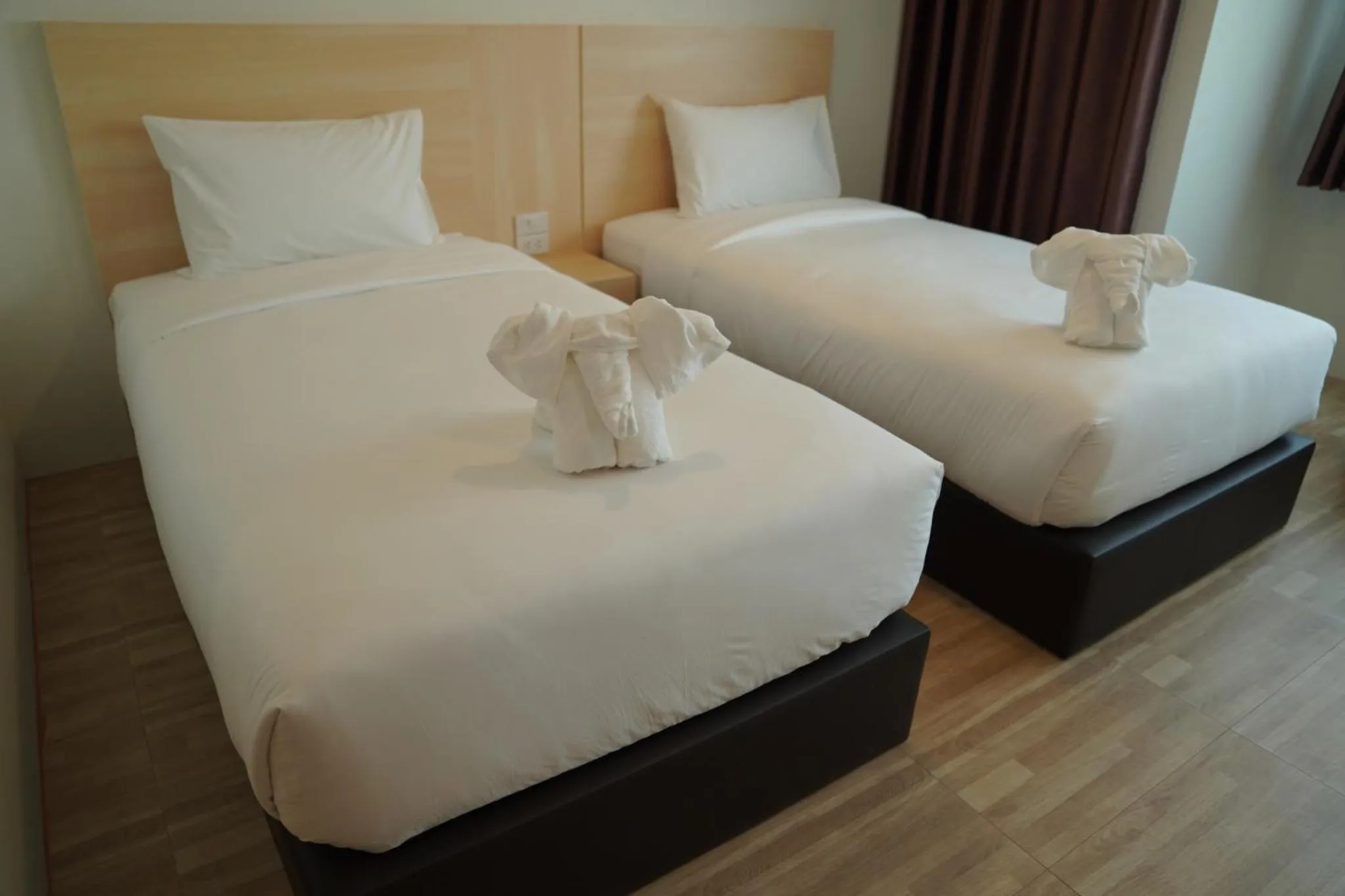 Bed in The charlotte smart hotel lopburi