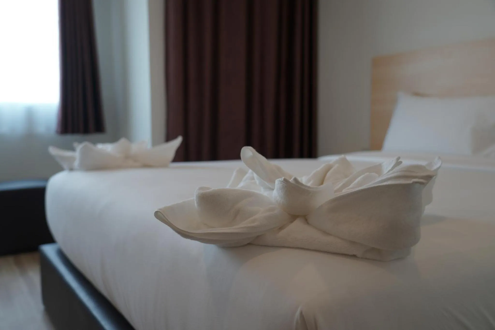 Bed in The charlotte smart hotel lopburi
