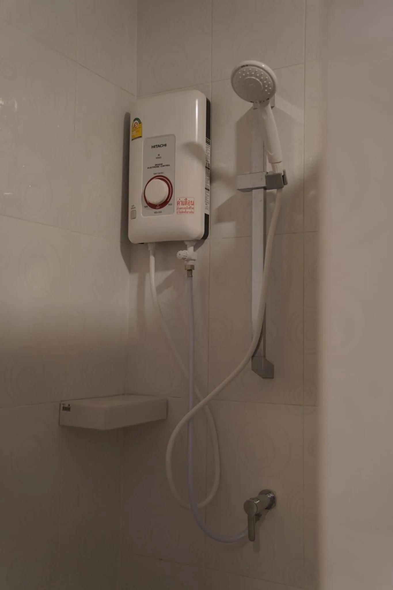 Bathroom in The charlotte smart hotel lopburi