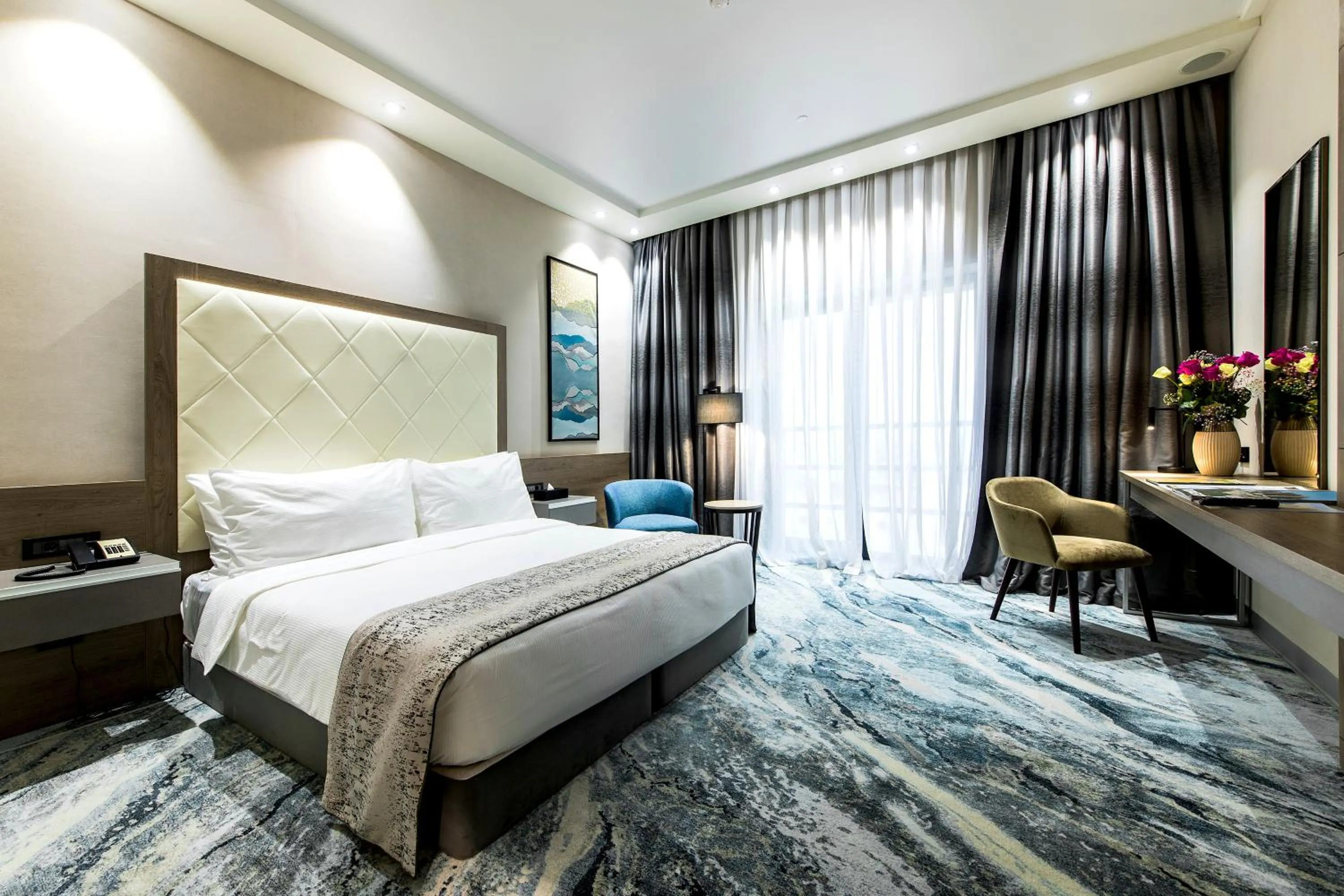 Photo of the whole room, Bed in Rixos Turkistan