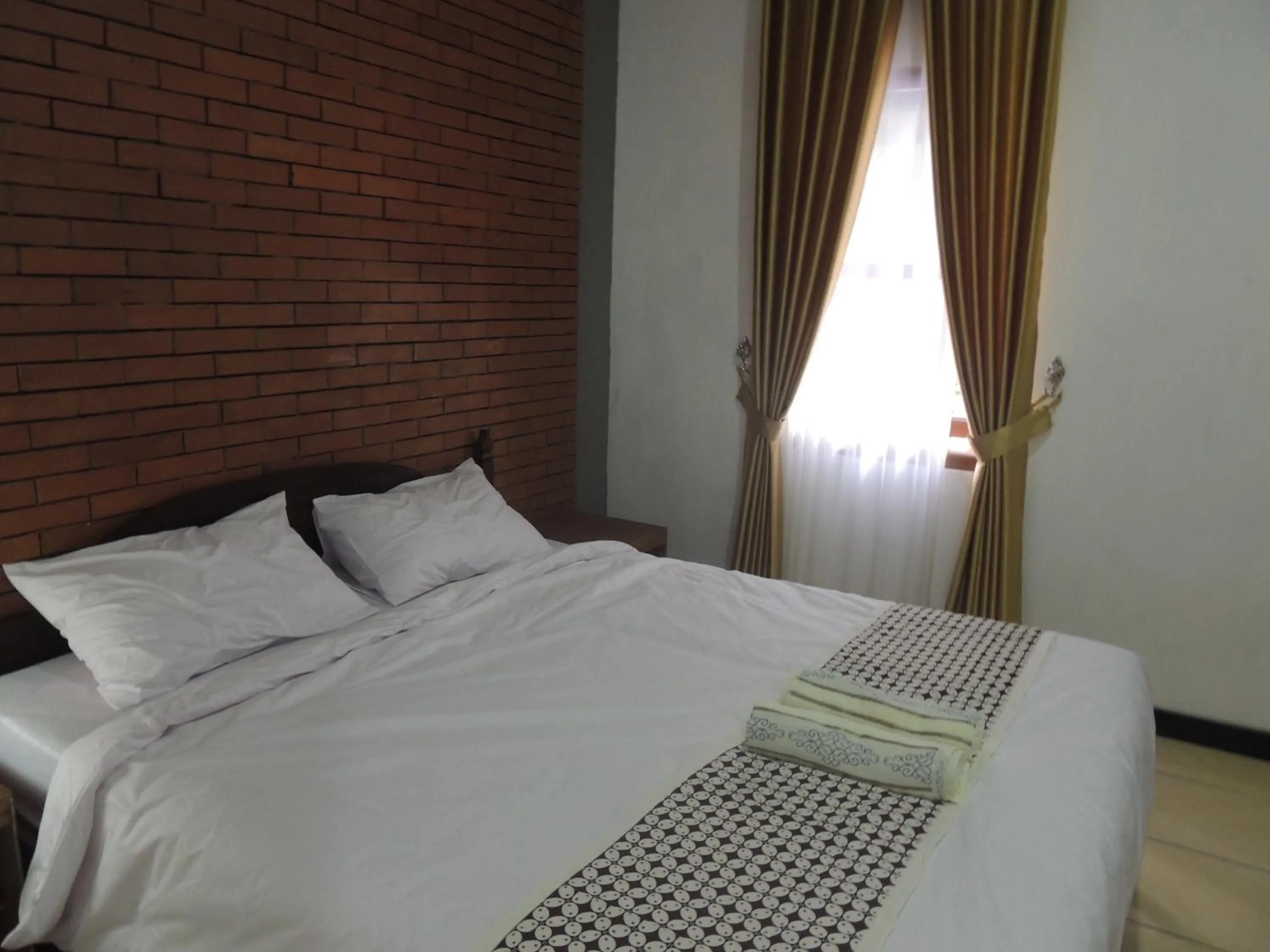 Bedroom in Omah Mardi Syariah by Ndalem Beong