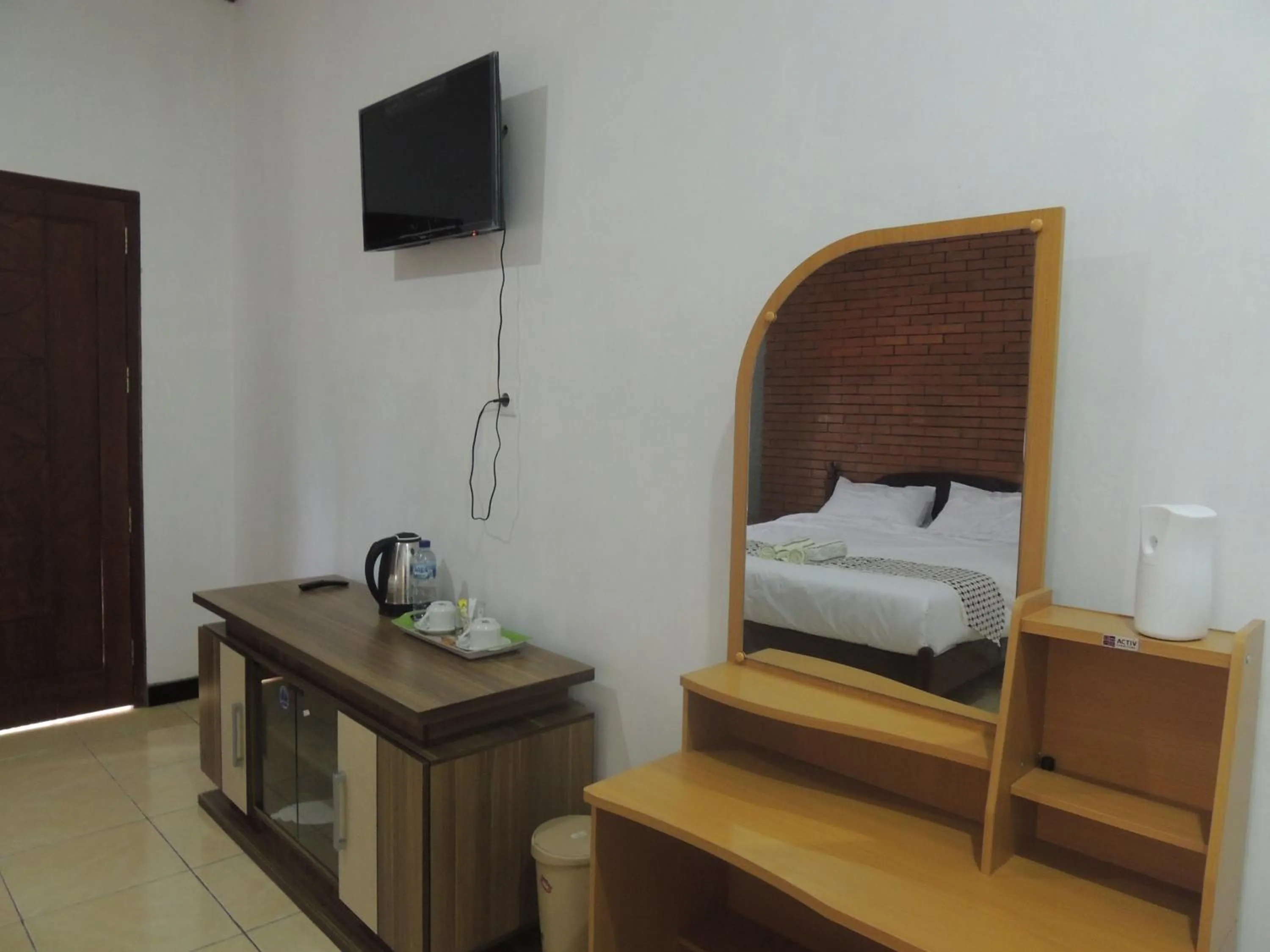 Bedroom in Omah Mardi Syariah by Ndalem Beong