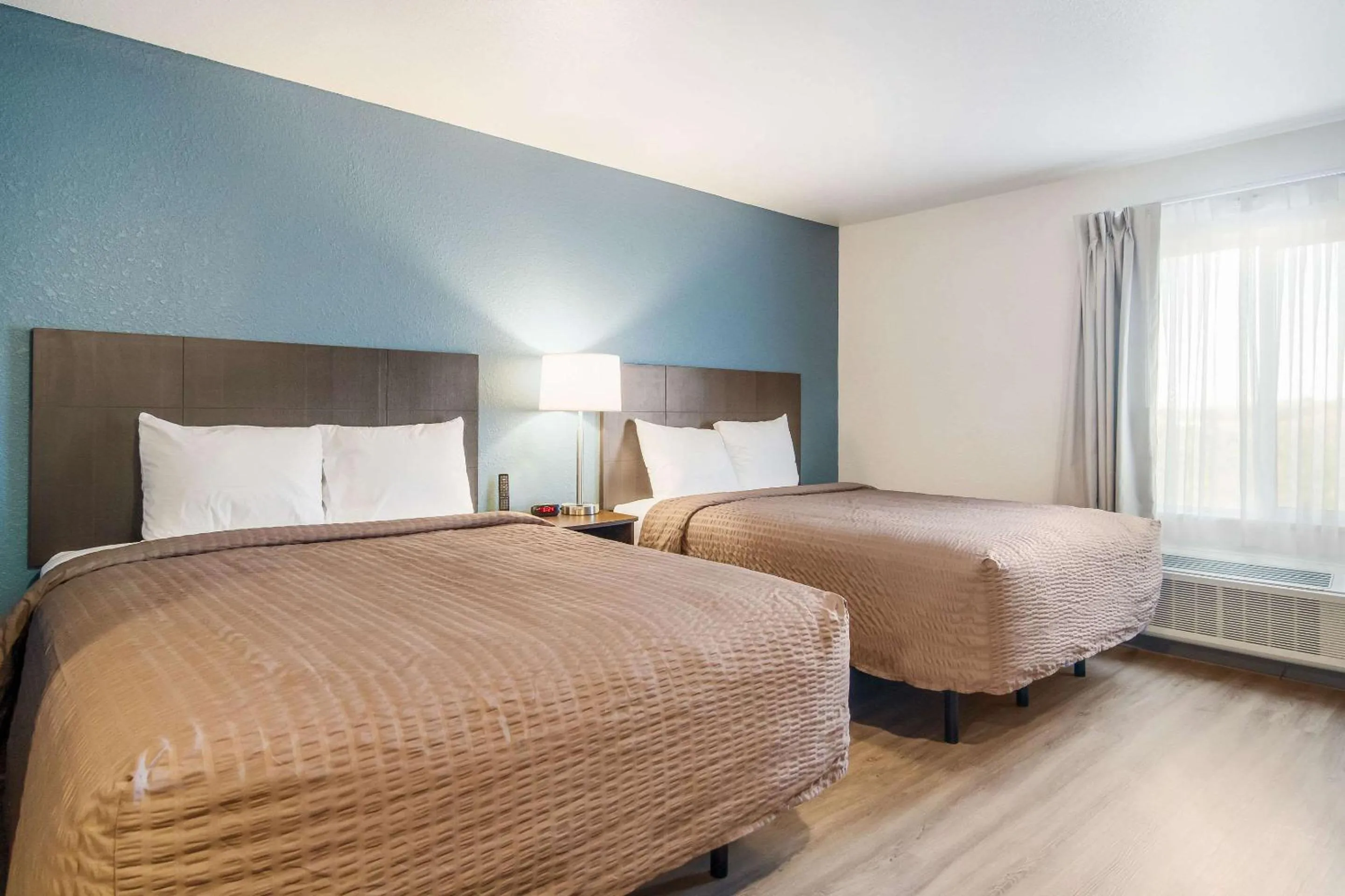 Photo of the whole room, Bed in WoodSpring Suites Jacksonville Baymeadows