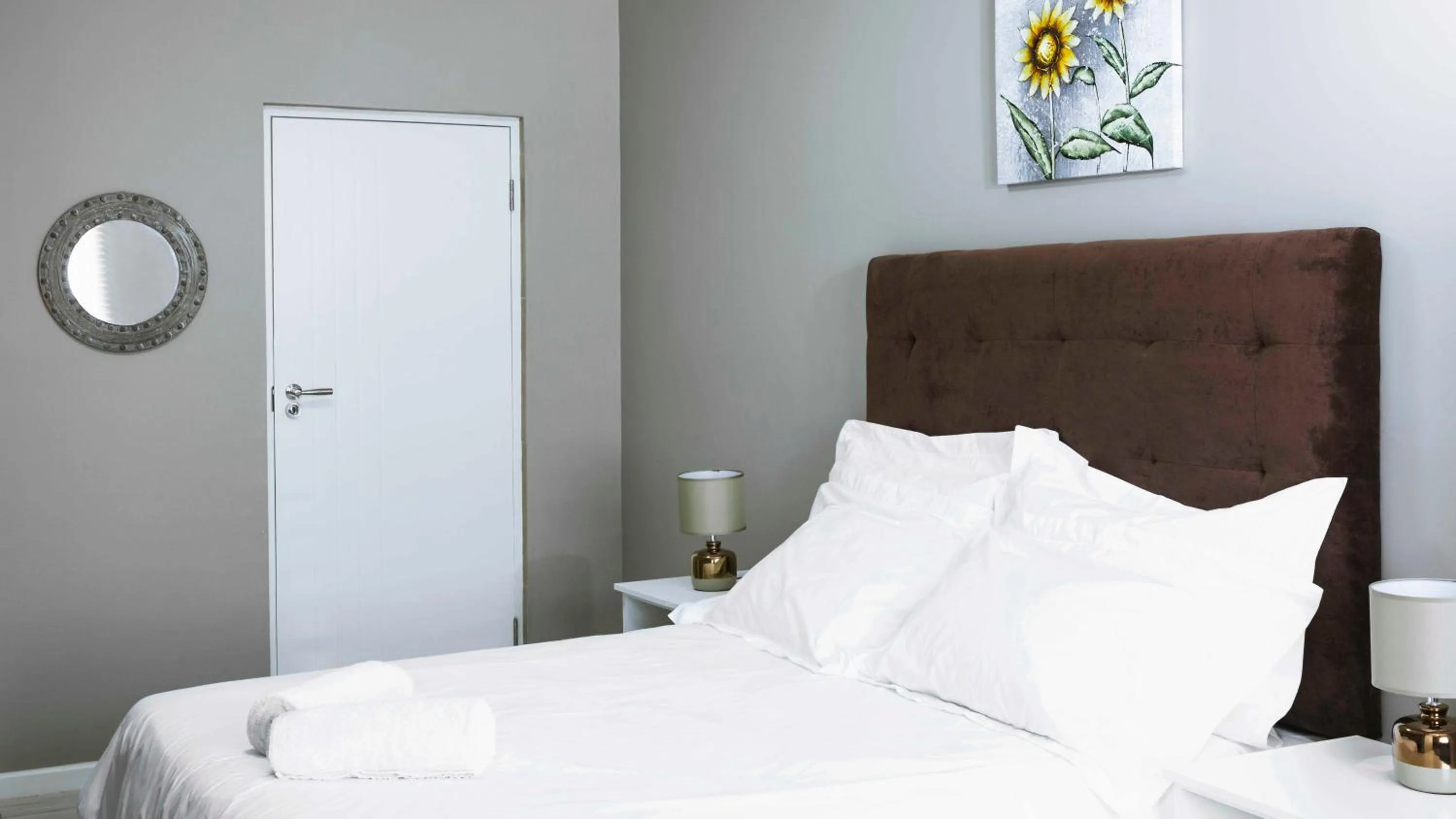 Bed in 103onWallace Self Catering Guest House