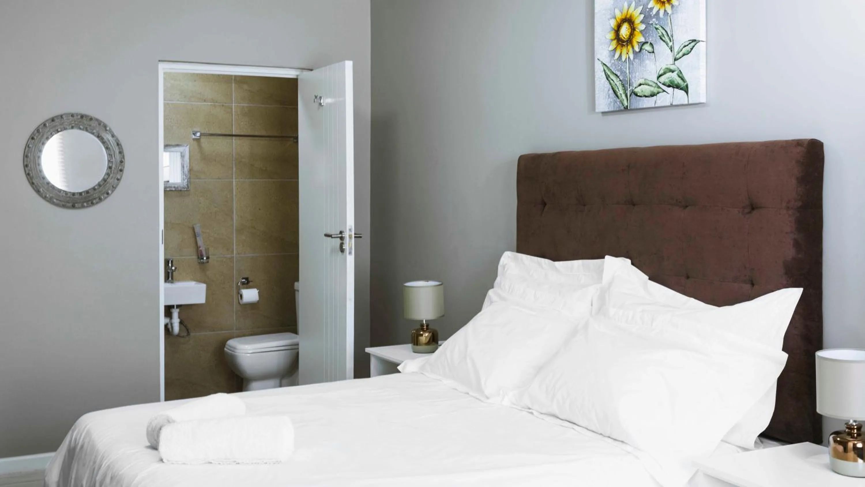 Bed in 103onWallace Self Catering Guest House