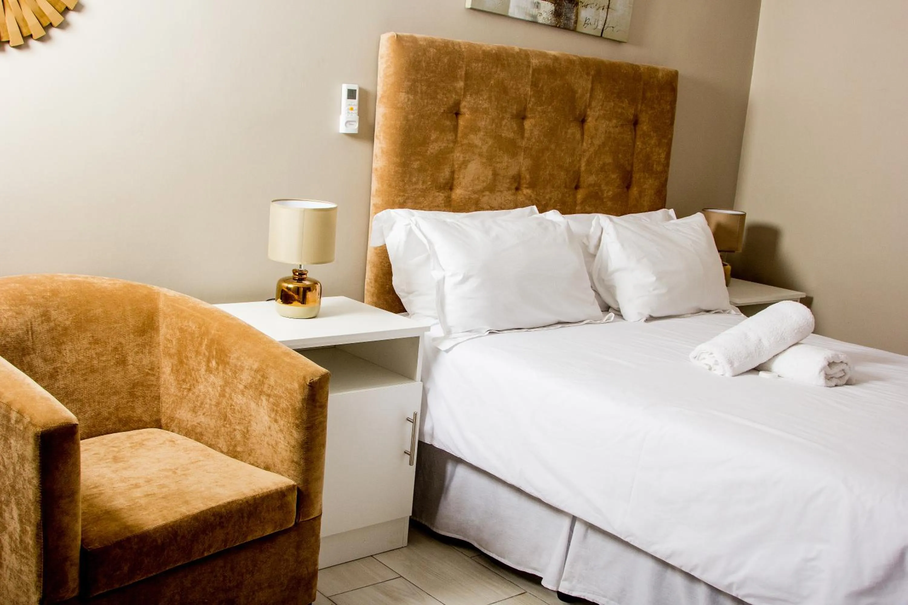 Bed in 103onWallace Self Catering Guest House