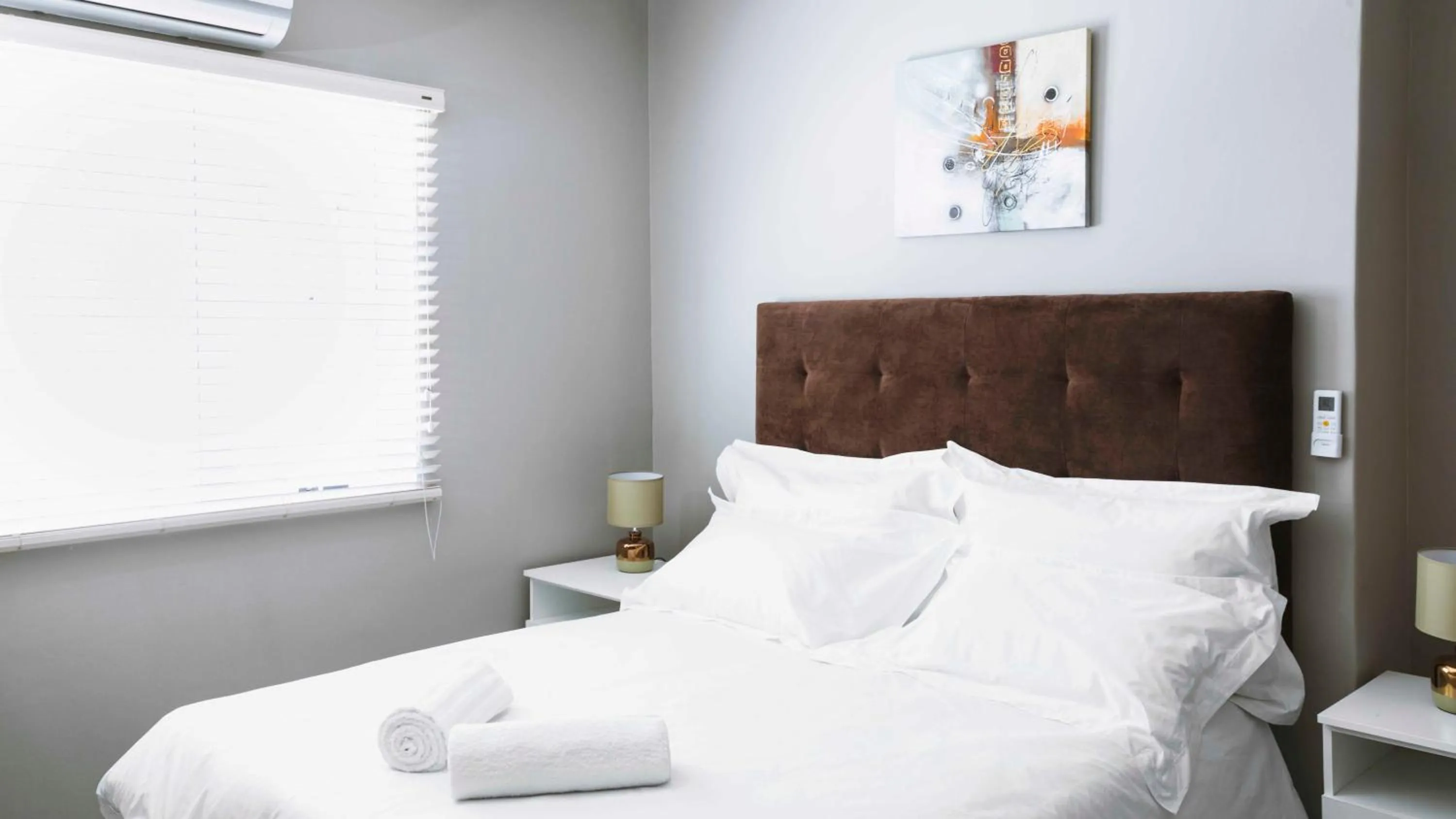 Bed in 103onWallace Self Catering Guest House