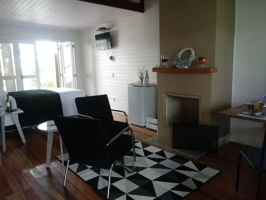 Living room in Pousada Toscana Cambará