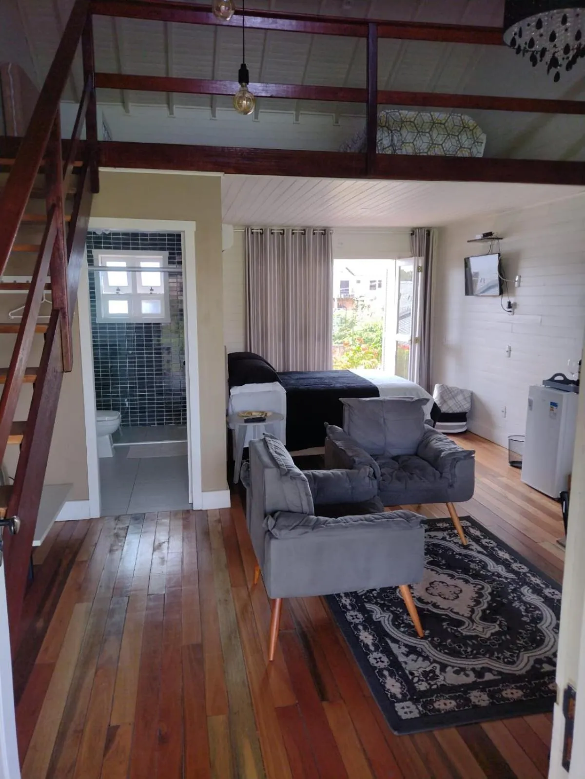 Living room in Pousada Toscana Cambará