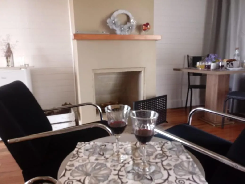 Living room in Pousada Toscana Cambará